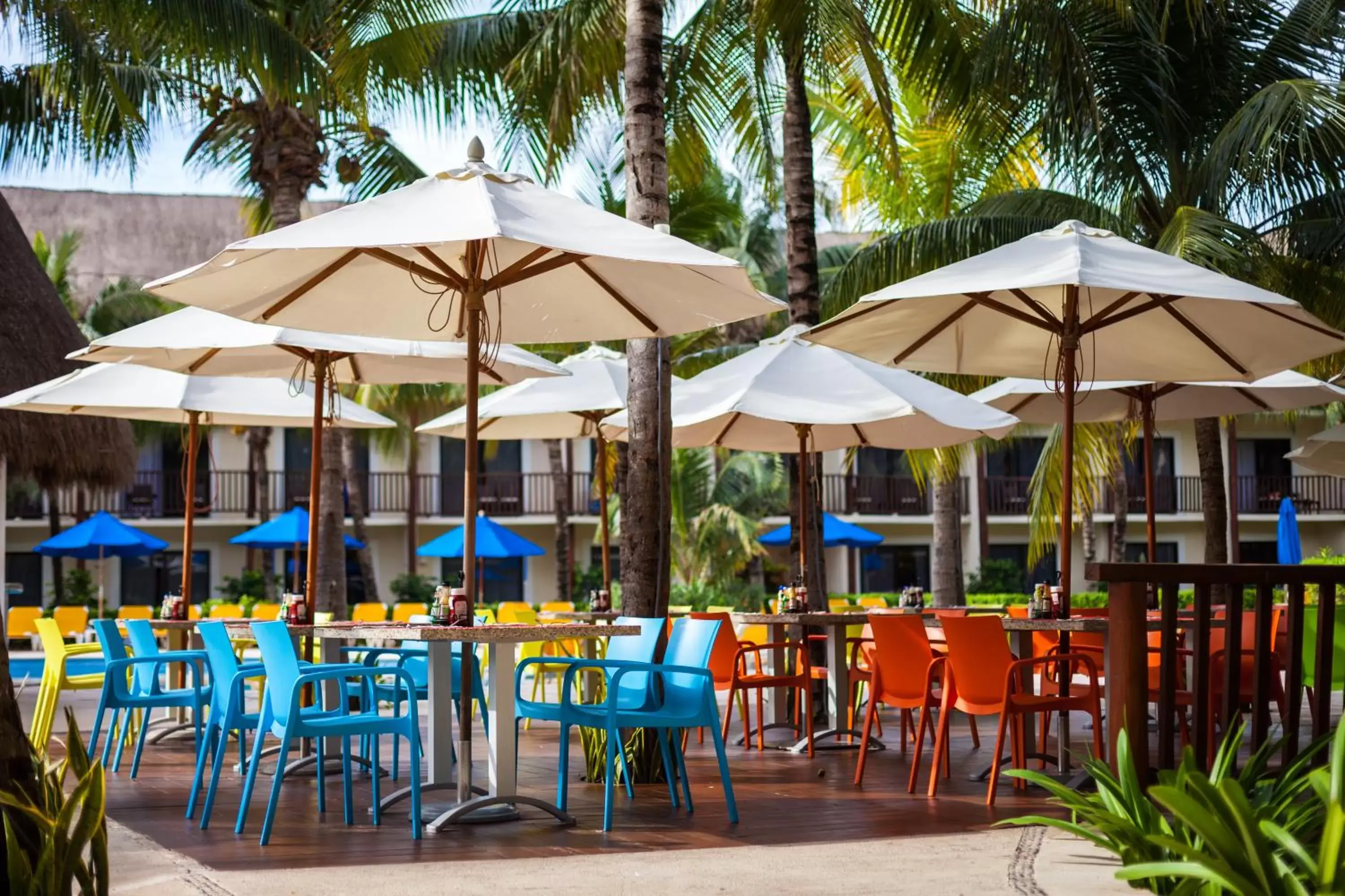 Patio, Restaurant/Places to Eat in The Reef Coco Beach & Spa- Optional All Inclusive