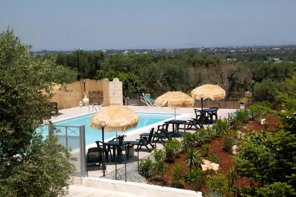 Swimming pool in L'Isola Felice e Trulli Sotto Le Stelle