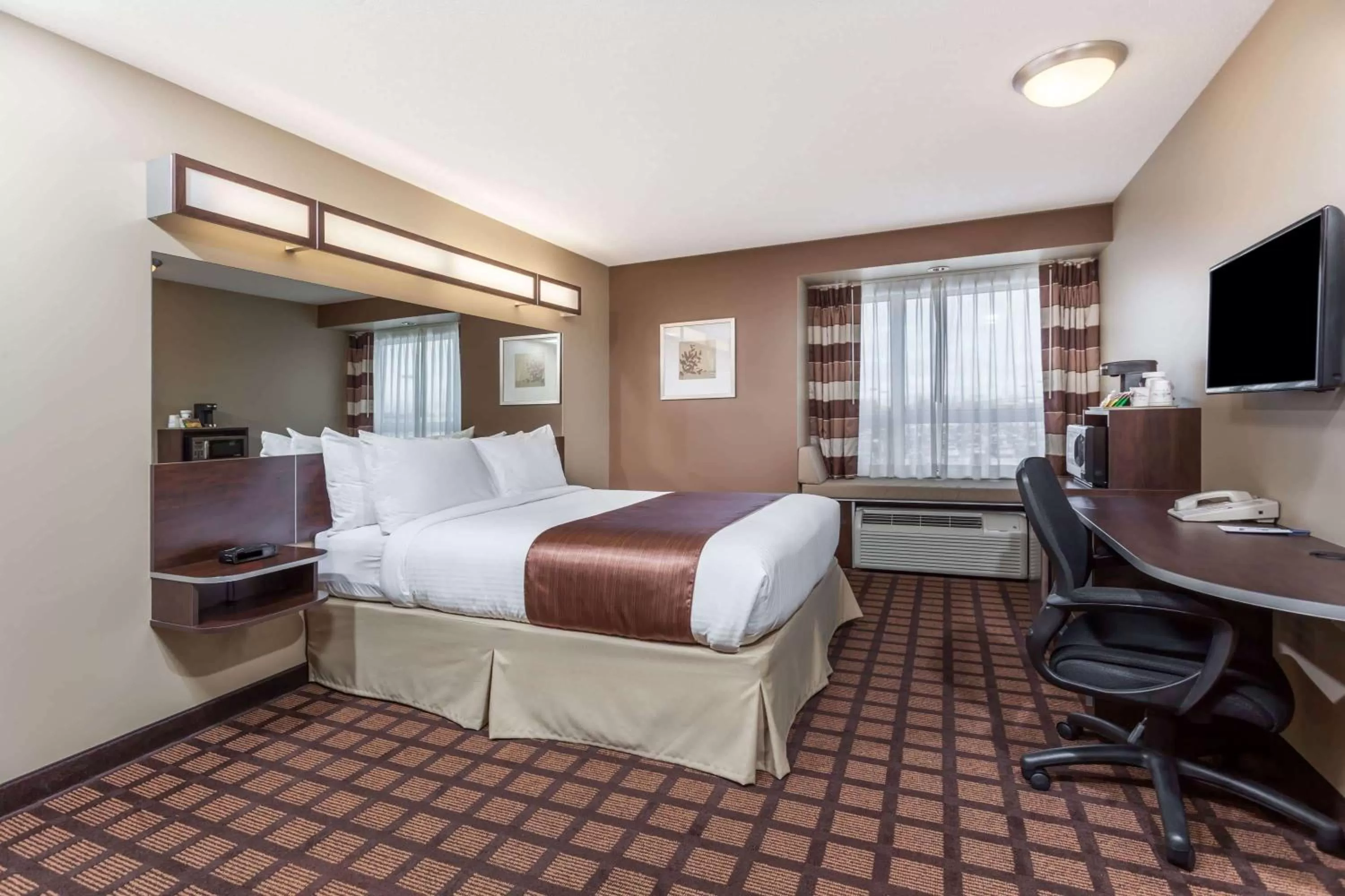 Photo of the whole room, Bed in Microtel Inn & Suites by Wyndham - Timmins