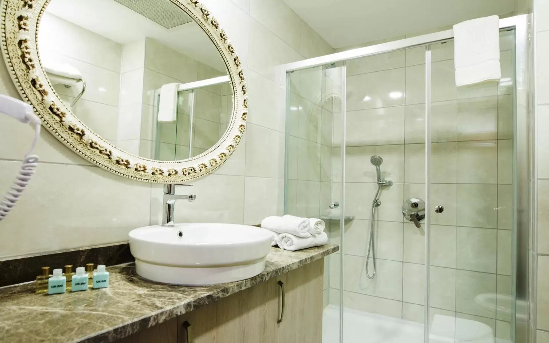 Bathroom in Helen Troya Hotel Geyikli Bathroom in Helen Troya Hotel Geyikli