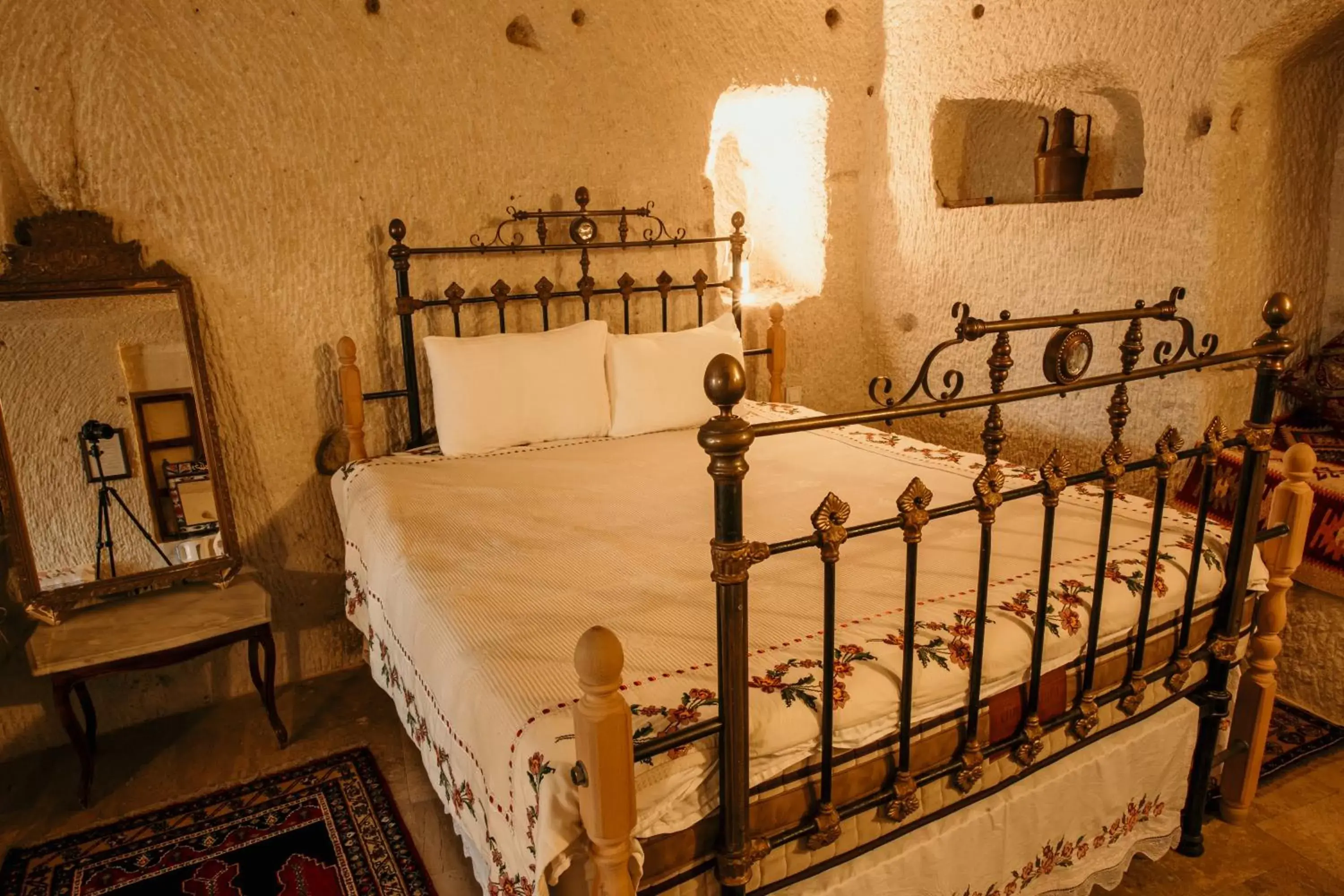 Bed in Village Cave House Hotel