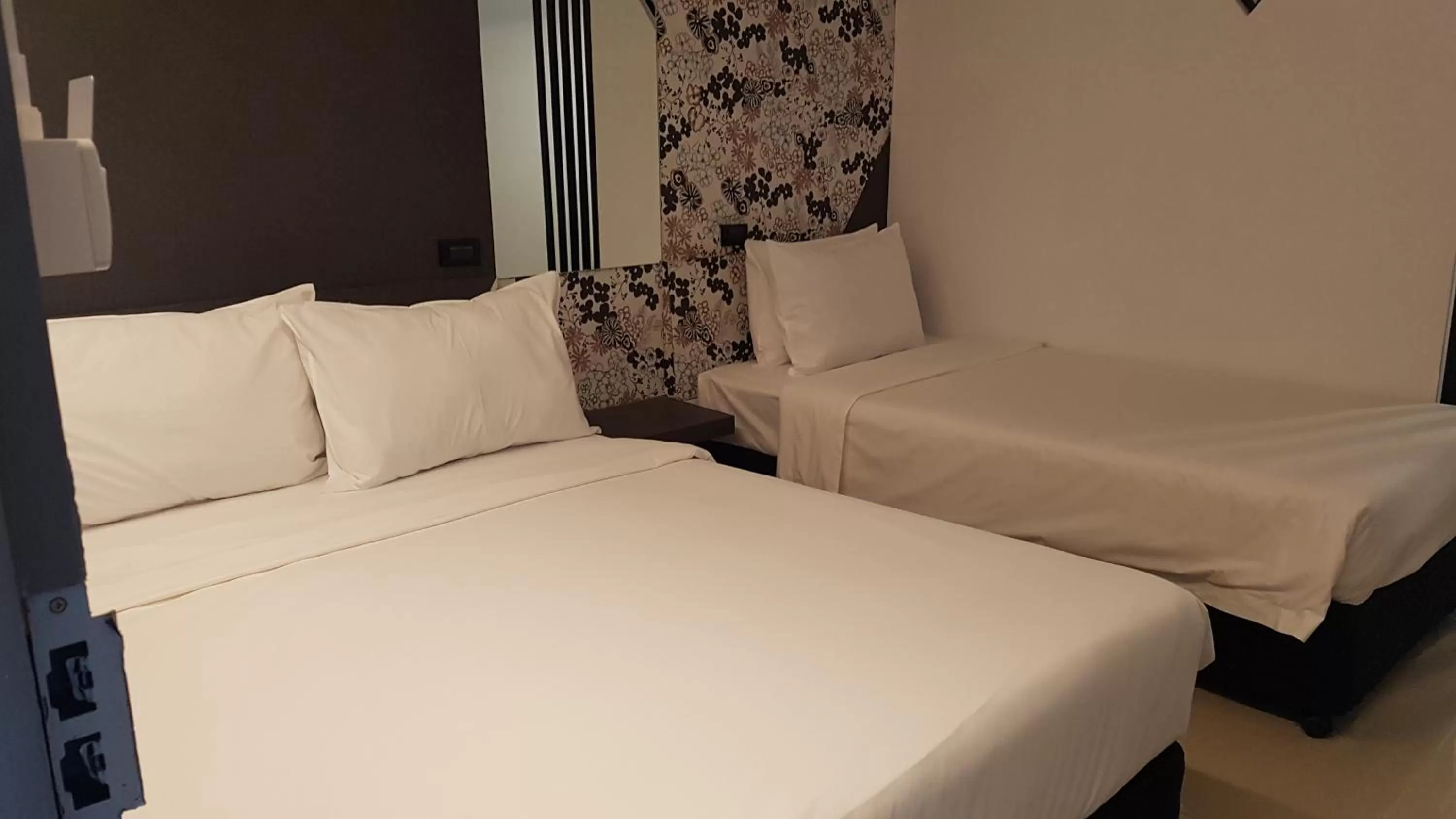 Bed in Loyy Hotel