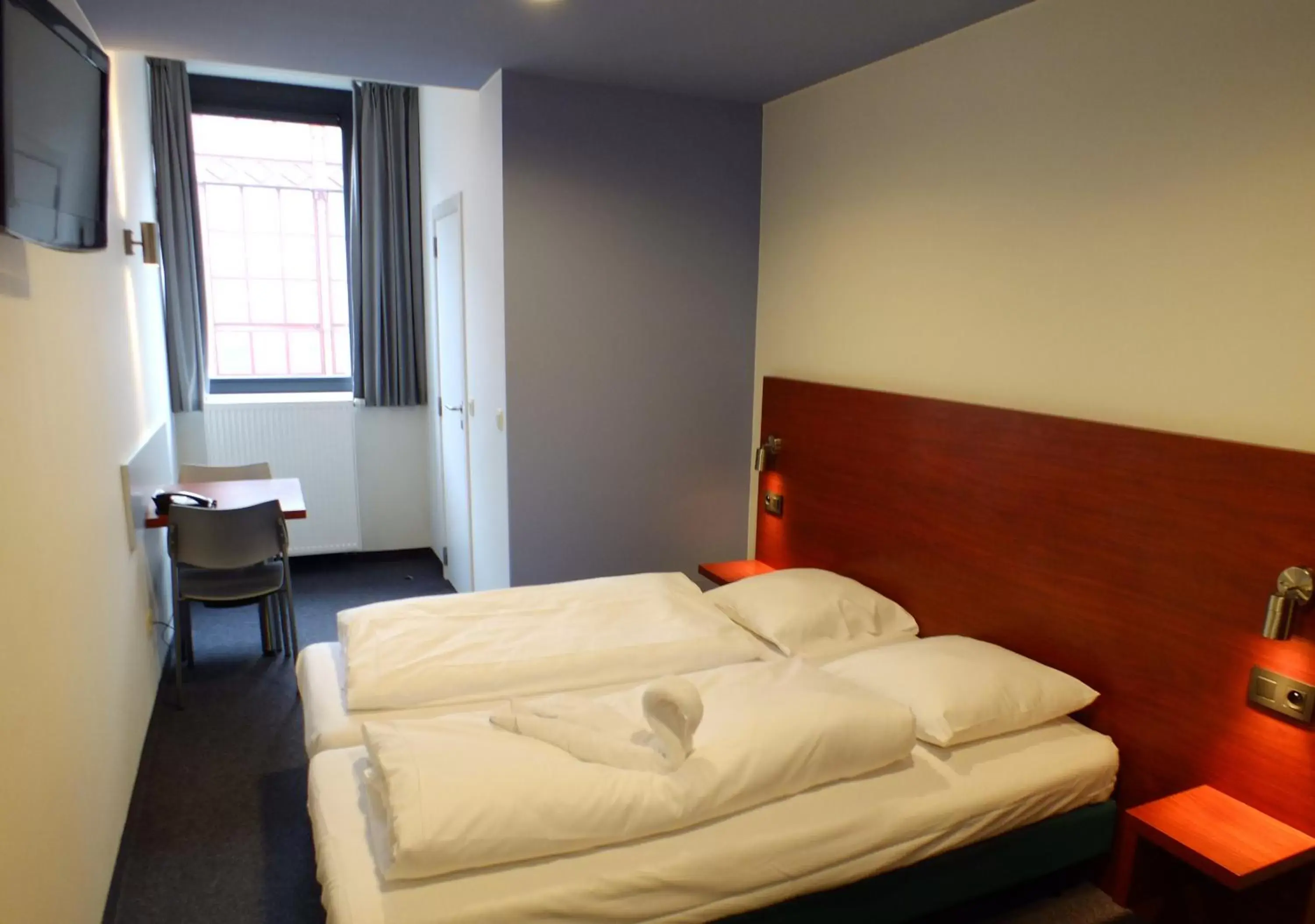 Bed in Century Hotel Antwerpen Centrum