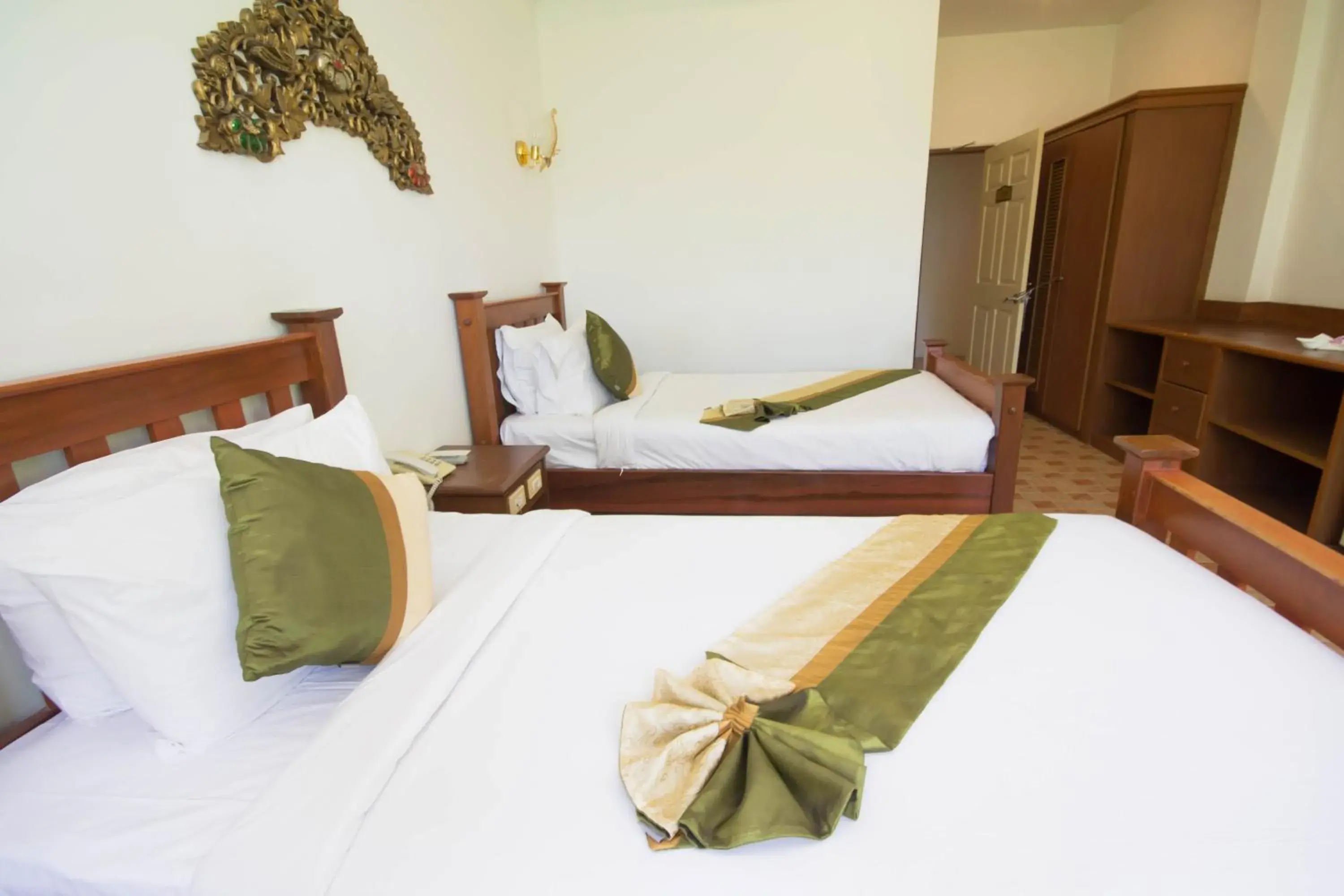 Bed in Rajapruek Samui Resort - SHA Plus