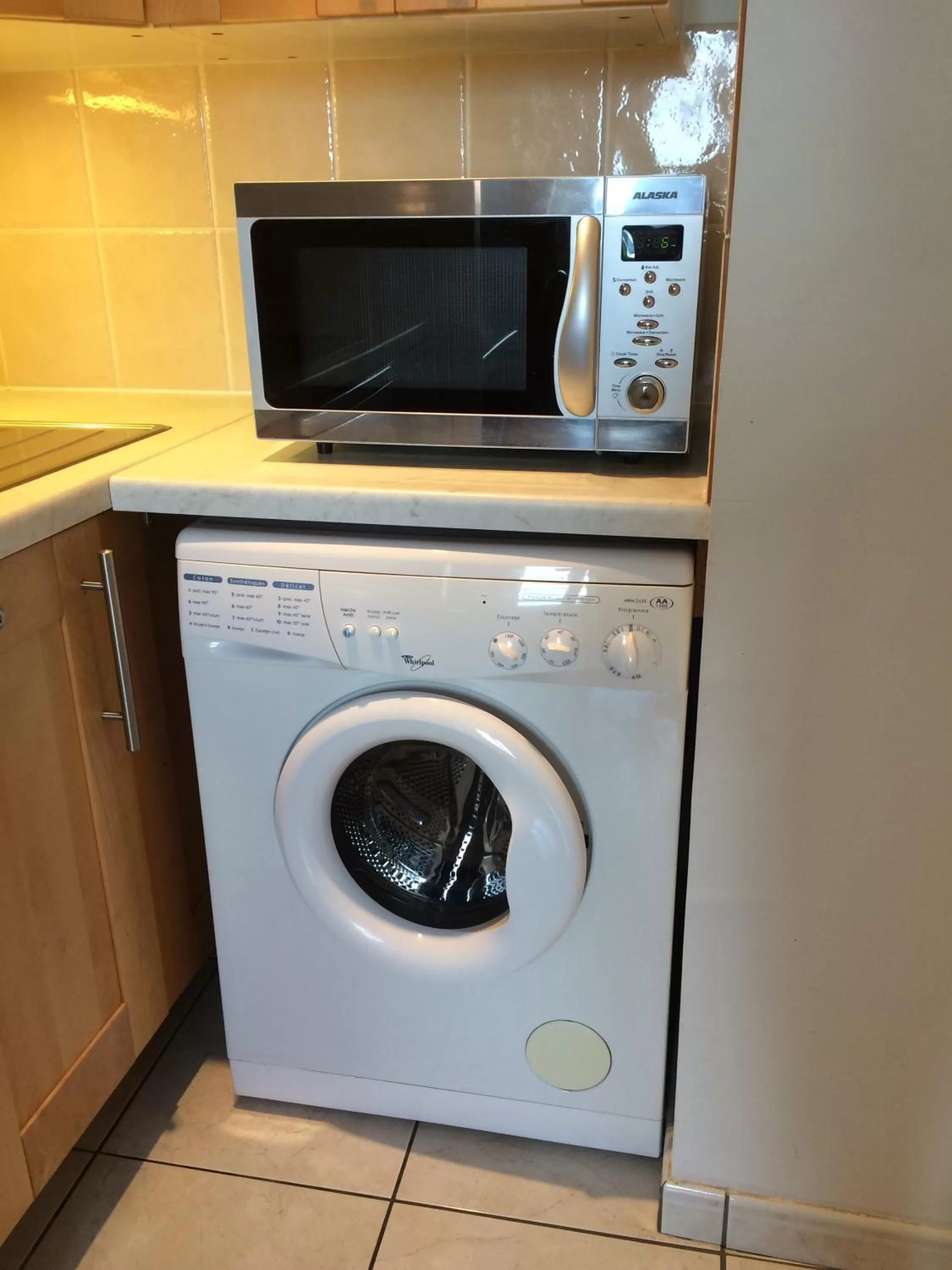 Kitchen or kitchenette in Hôtel & Appart-hôtel Olatua