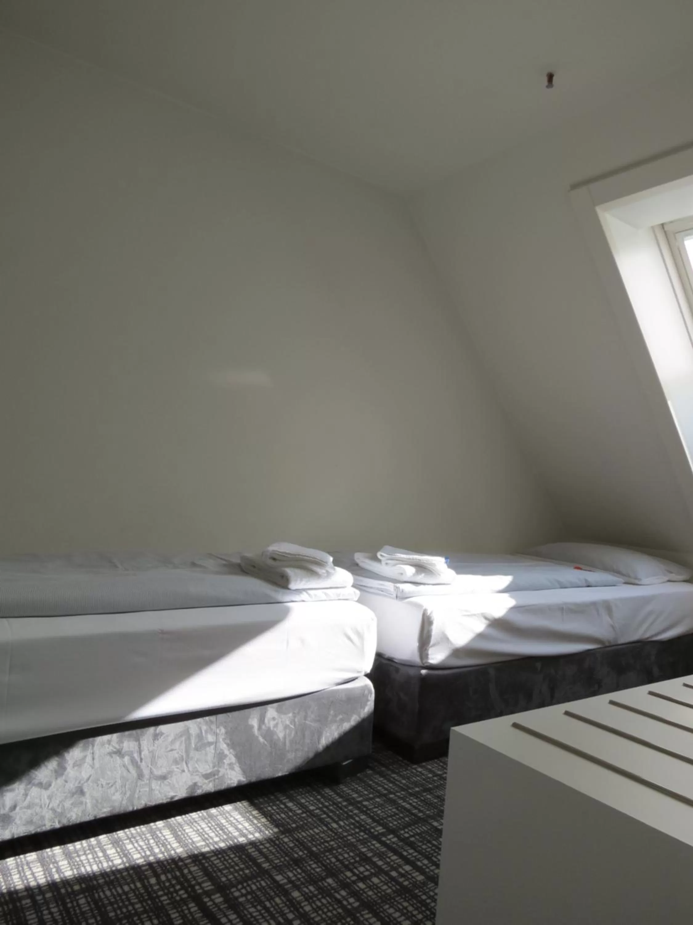 Bed in Comfor Hotel Ulm City