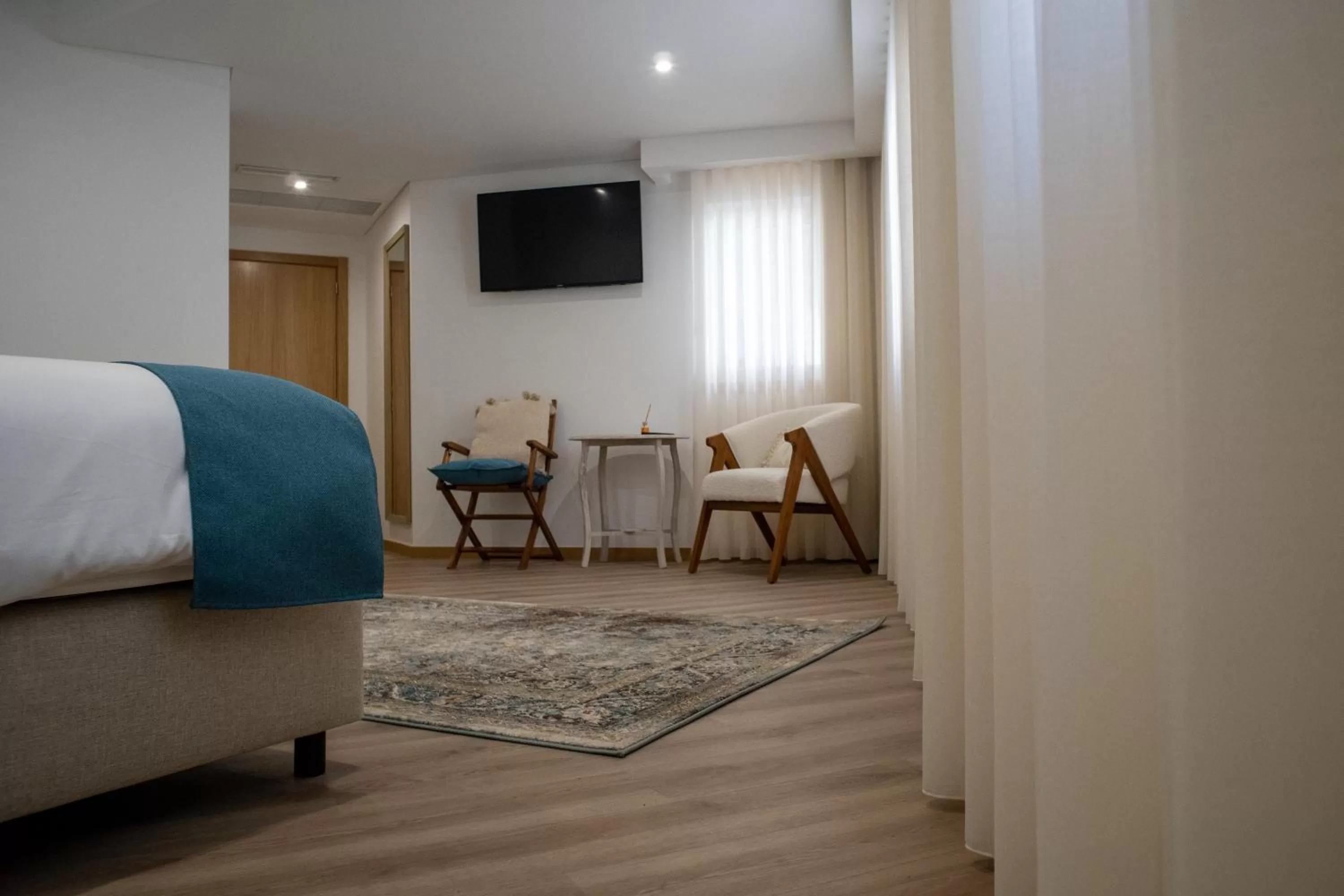 Bedroom, Seating Area in Loureiro B&B