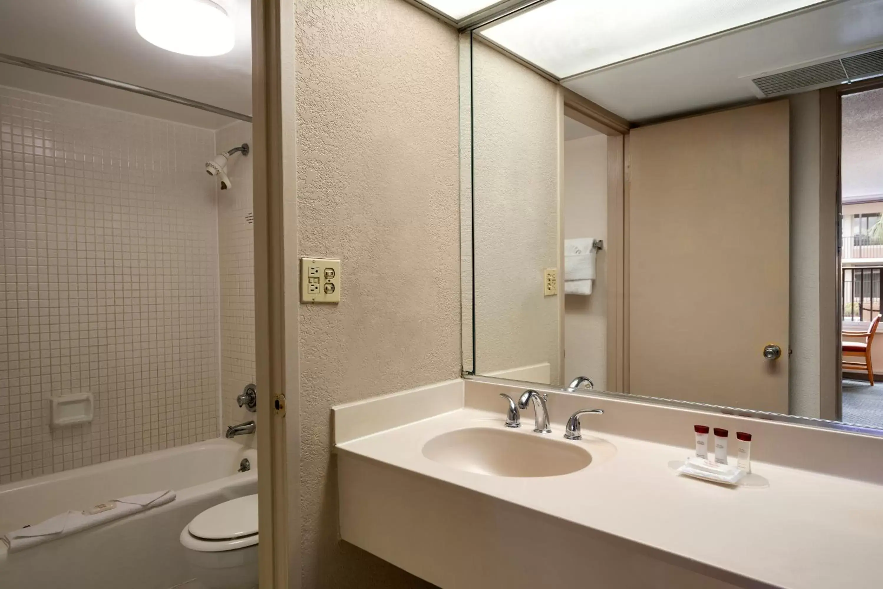 Bathroom in Ramada by Wyndham Kissimmee Gateway