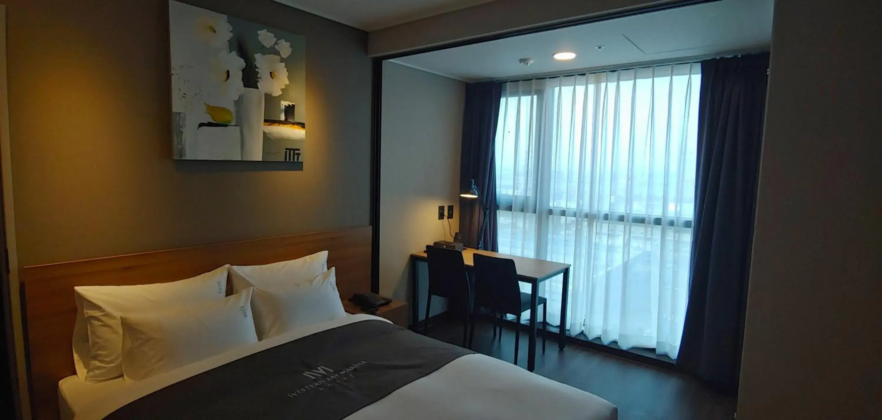 Bed in Westernbay Marina Hotel