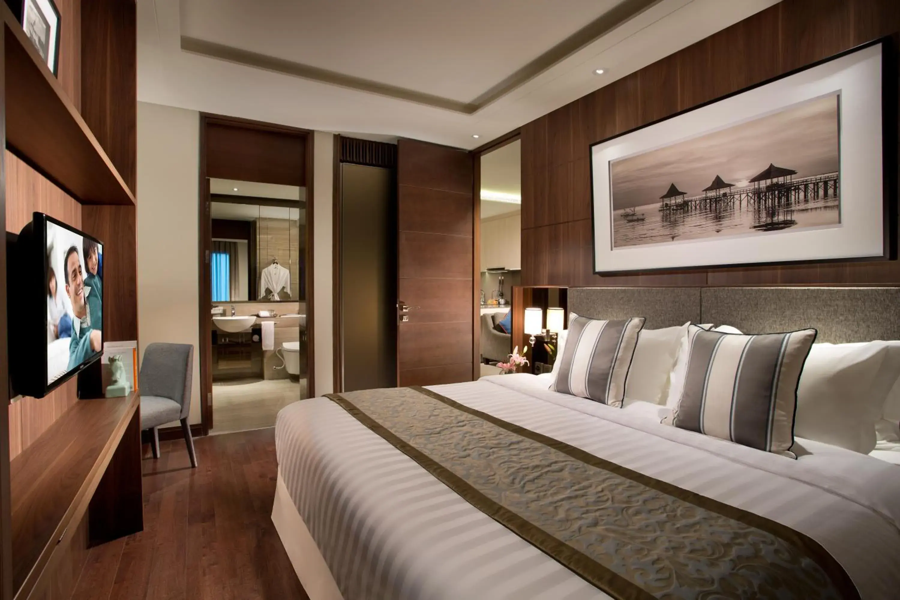 Photo of the whole room, Bed in Ascott Waterplace Surabaya