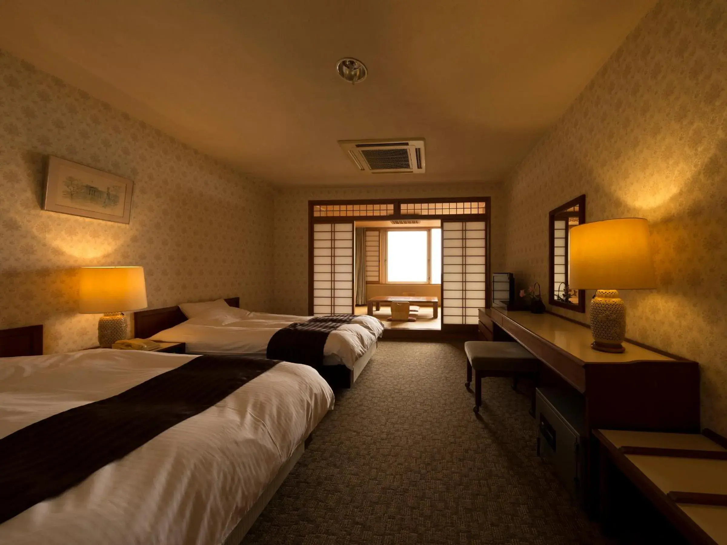 Bed in Ryochiku Bettei Hotel