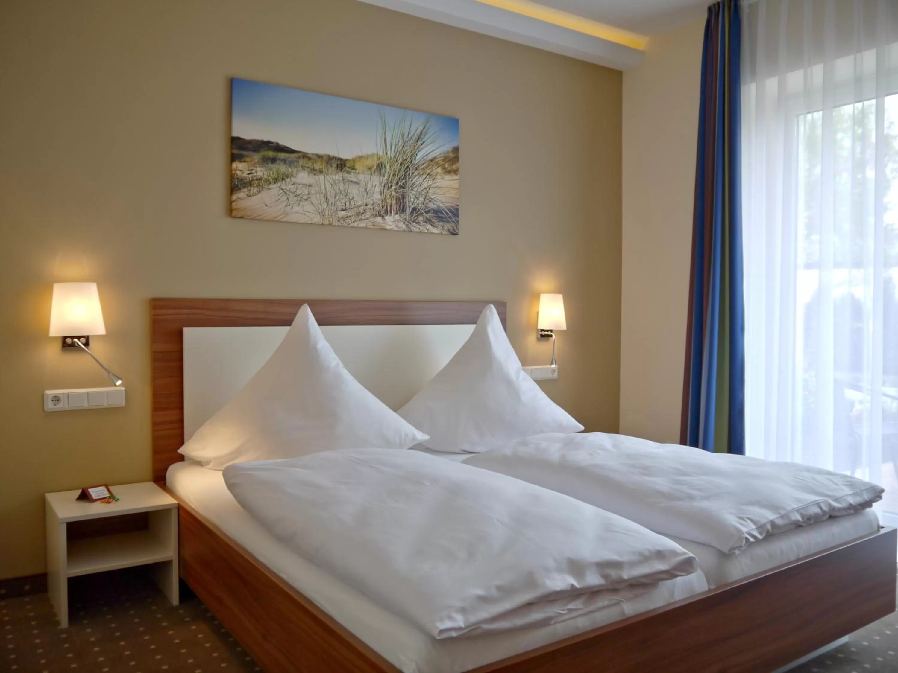 Photo of the whole room, Bed in Hotel Friesische Wehde