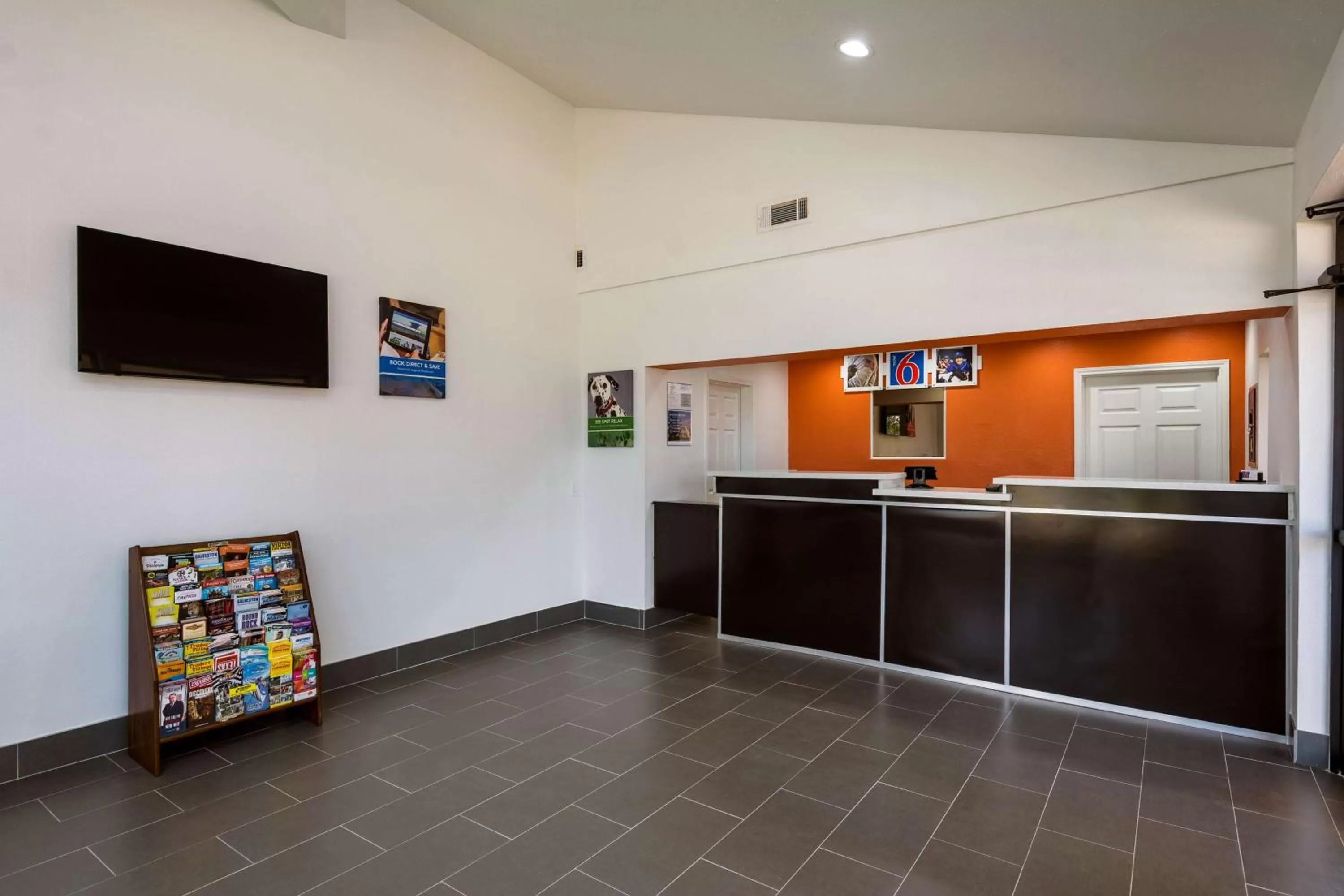 Property logo or sign in Motel 6-Freeport, TX