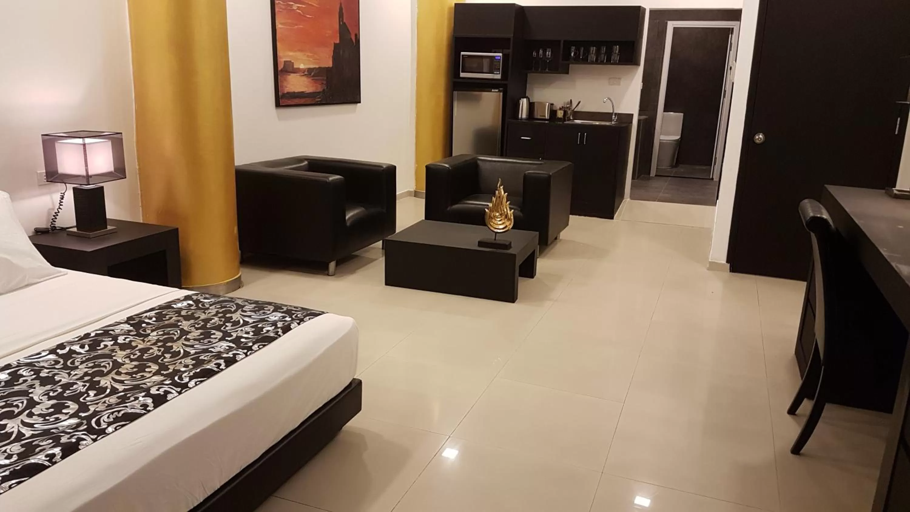 Photo of the whole room, Bed in East Suites