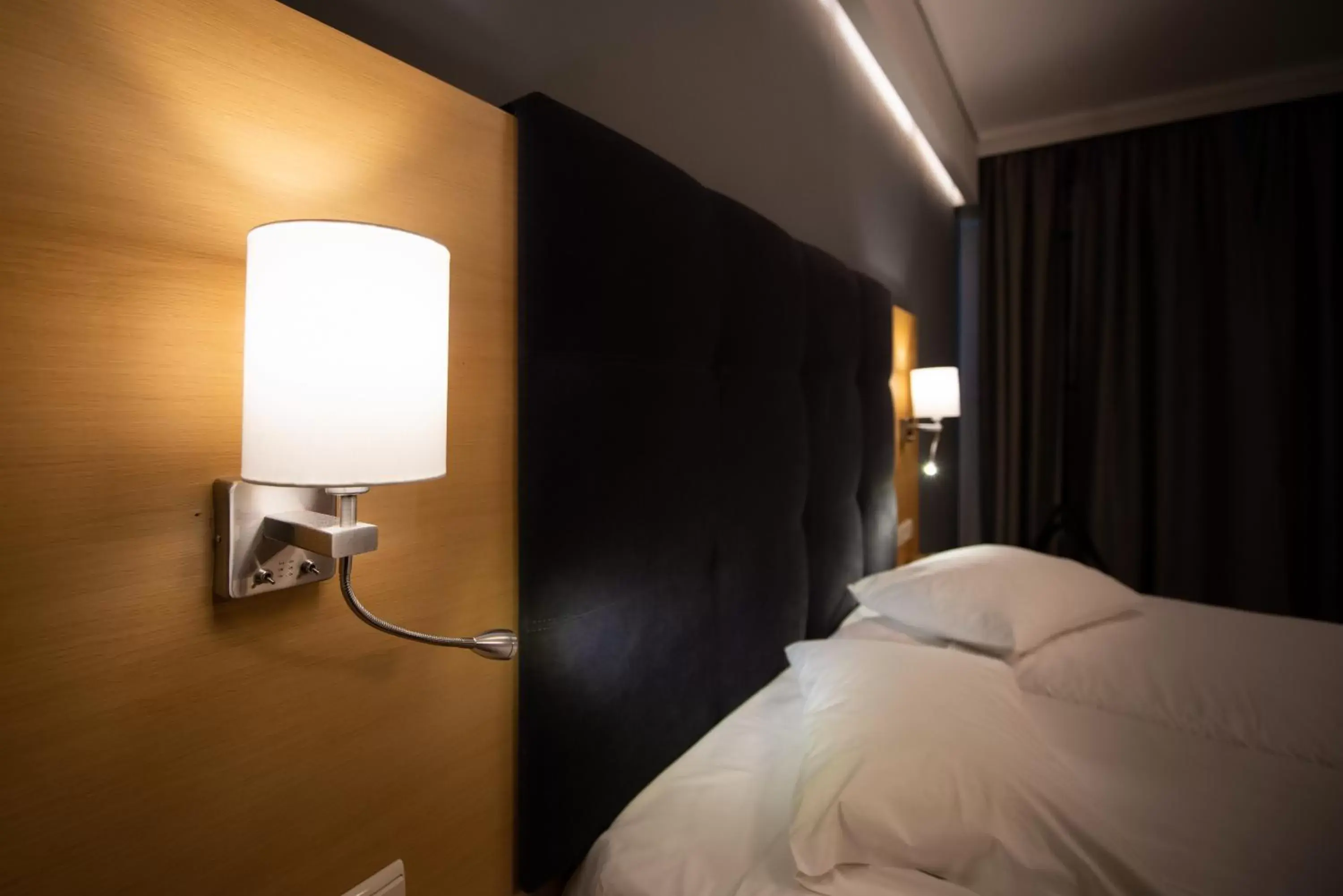 Bedroom, Bed in Heliotrope Hotels