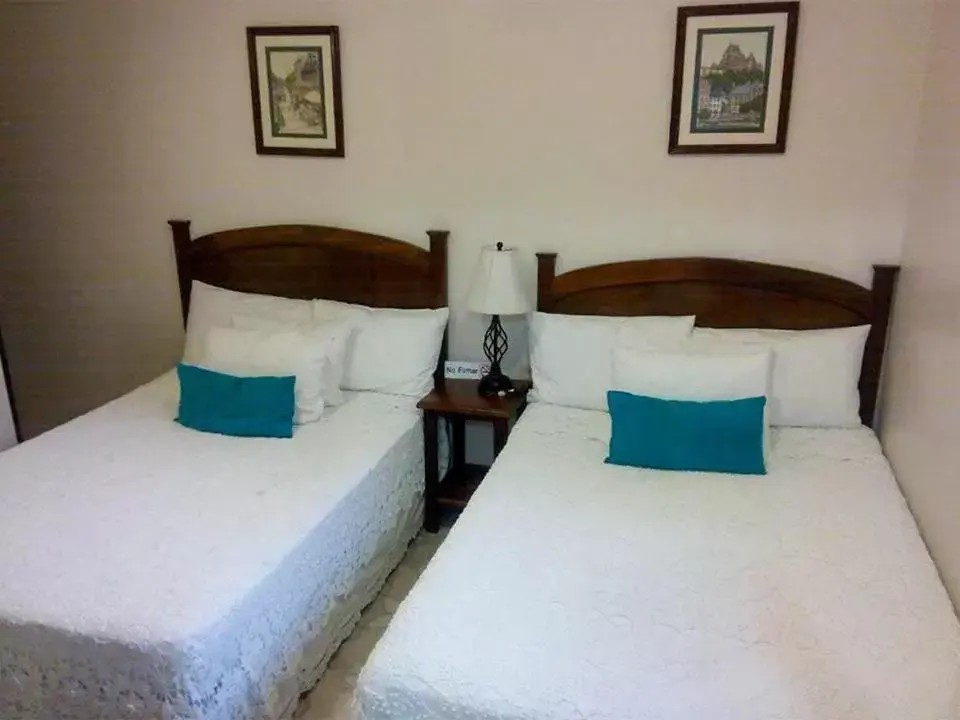 Bed in Hotel Casa Blanca by Rotamundos