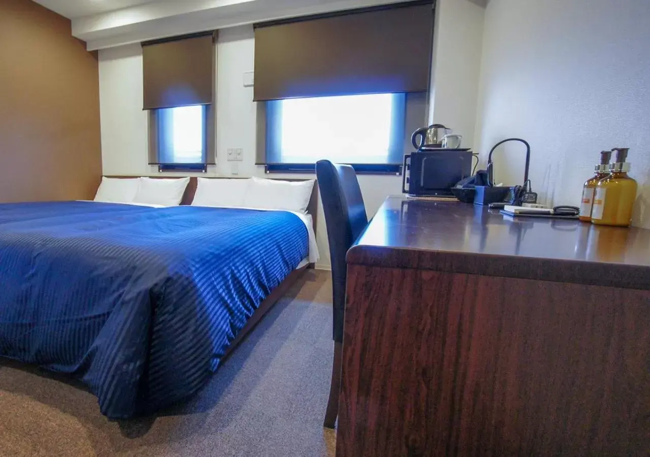 Bed in HOTEL LiVEMAX Kanazawa Ekimae