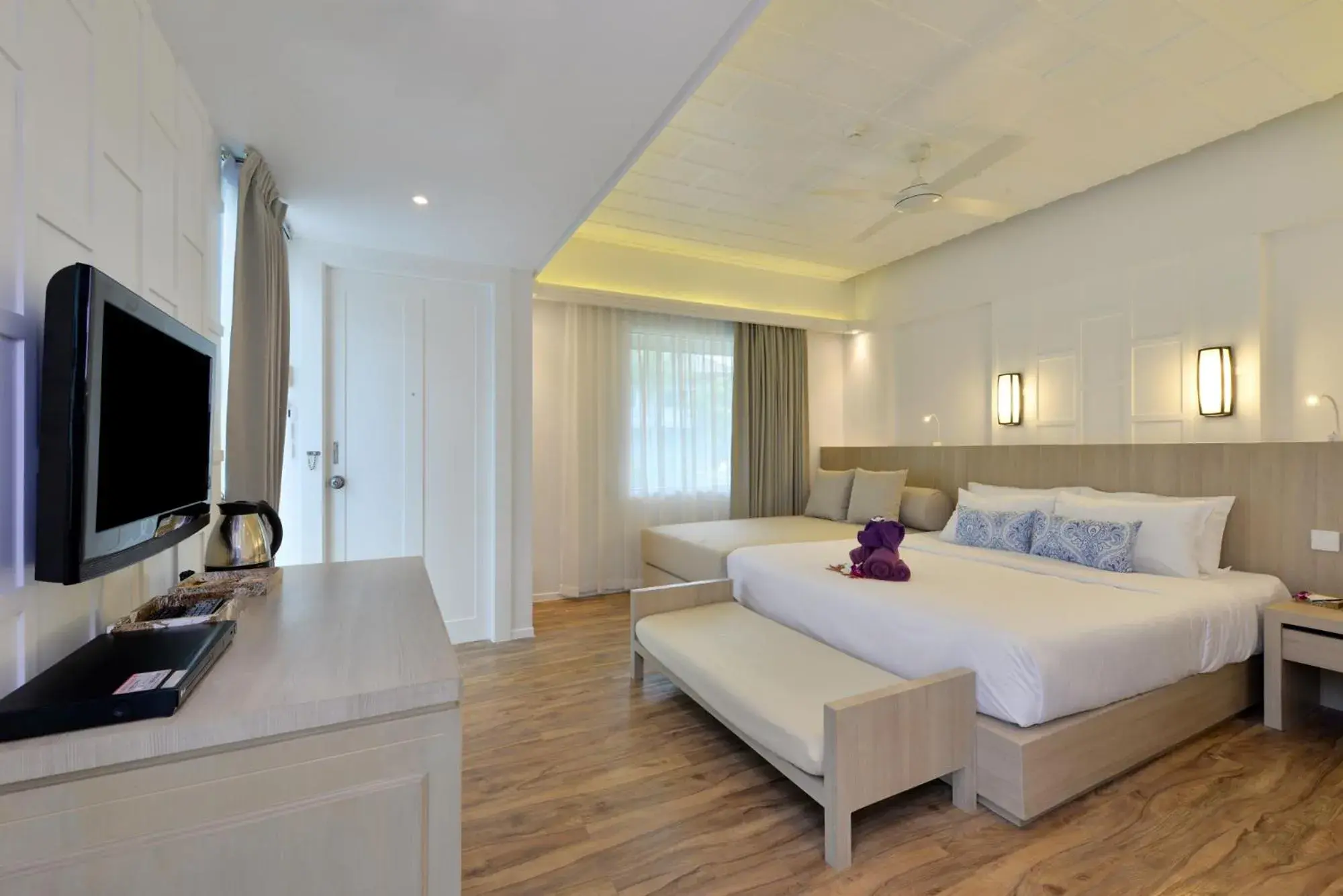 Bedroom, TV/Entertainment Center in Twin Lotus Resort and Spa - SHA Plus - Adult Only Hotel