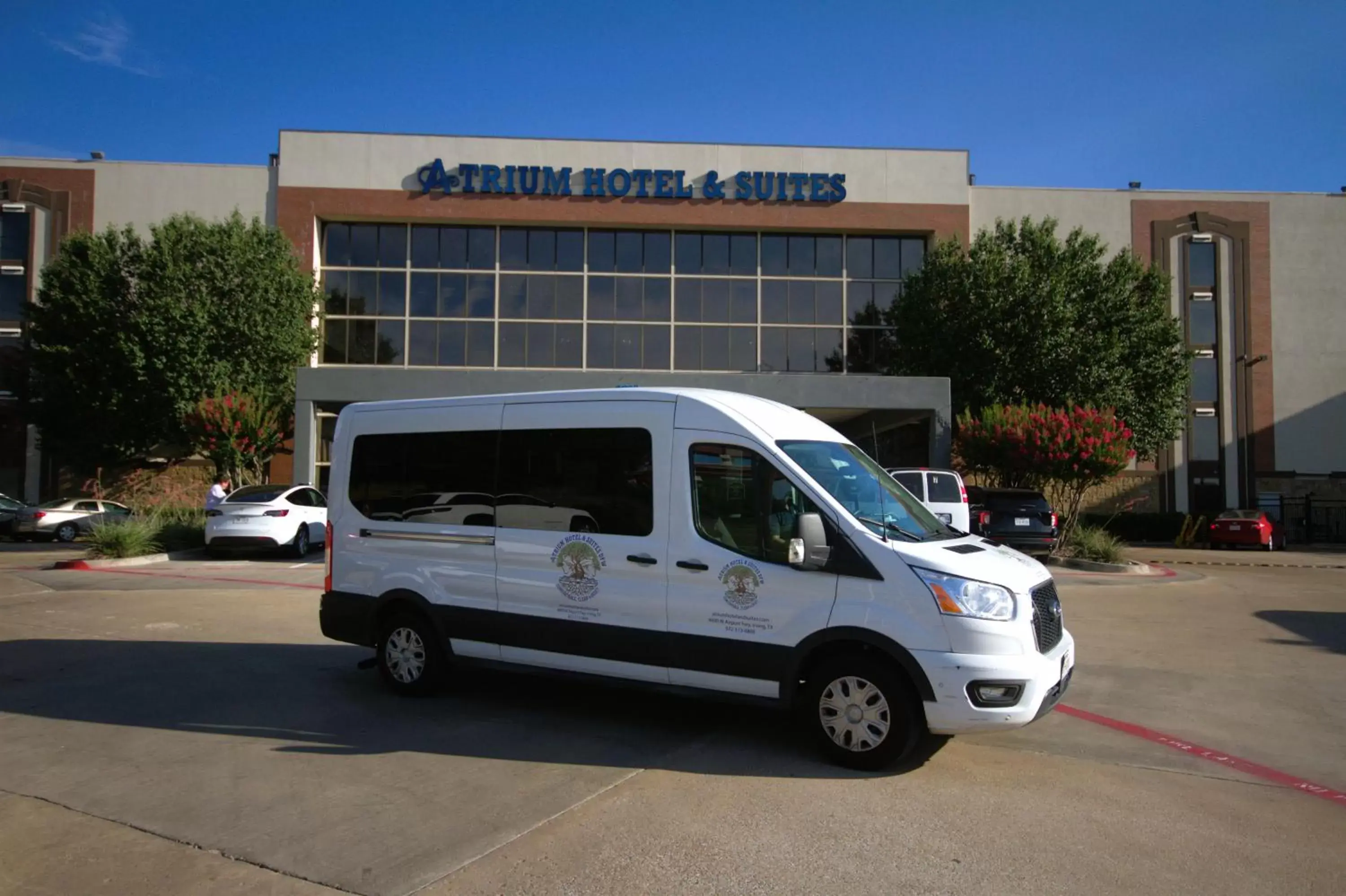 shuttle, Property Building in Atrium Hotel and Suites DFW Airport