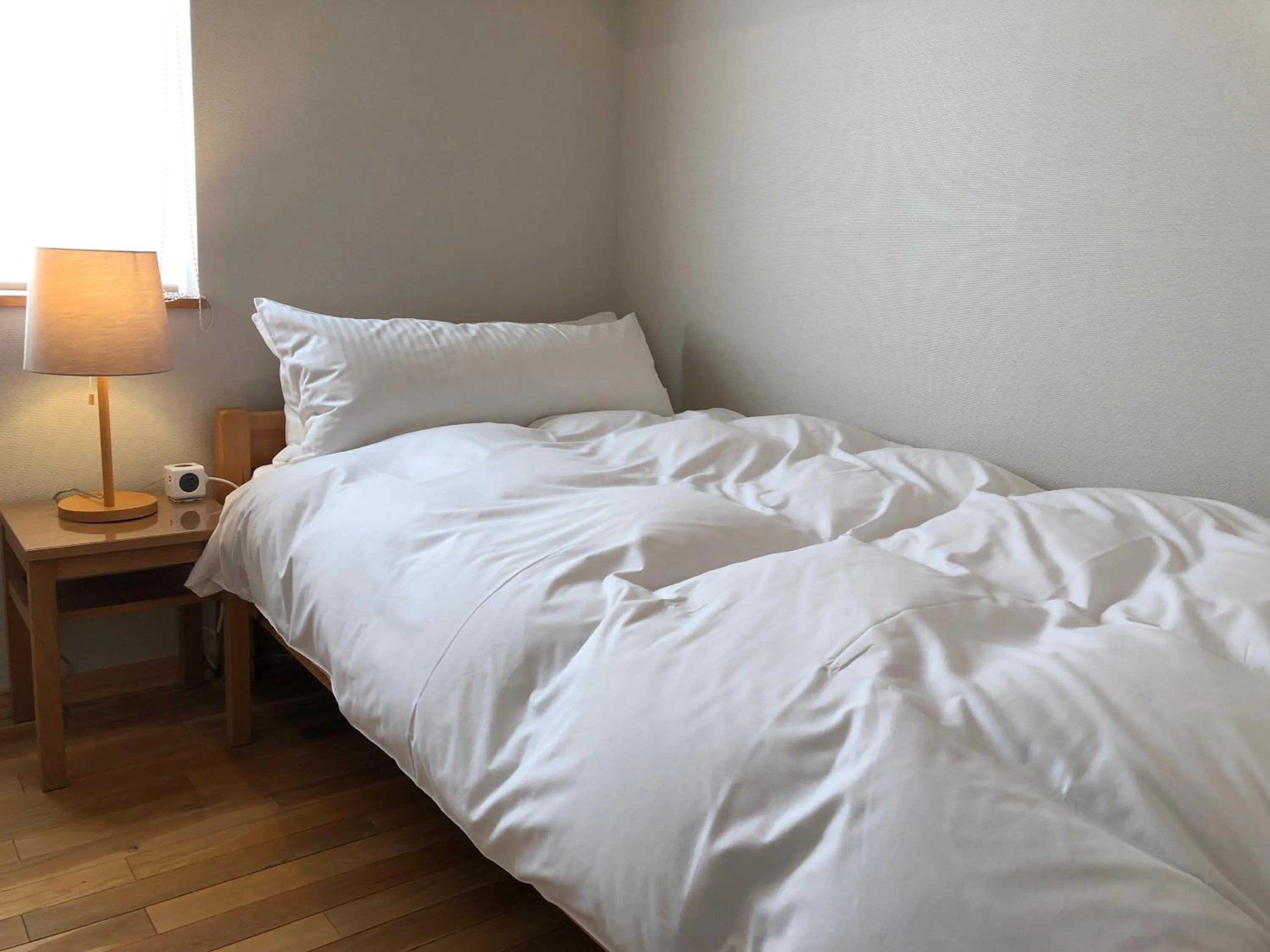 Bed in Hotel Resort Inn Niseko