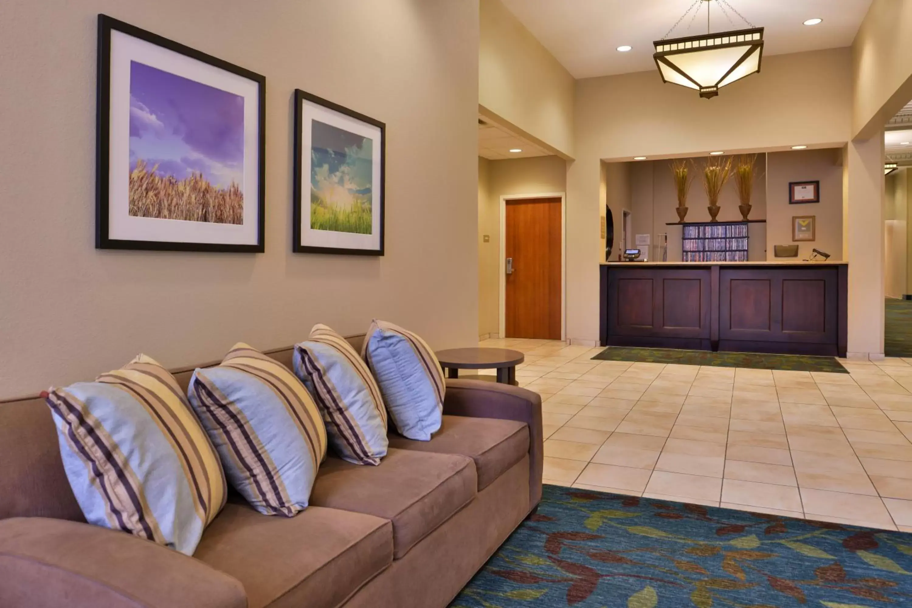 Property building, Seating Area in Candlewood Suites Terre Haute, an IHG Hotel