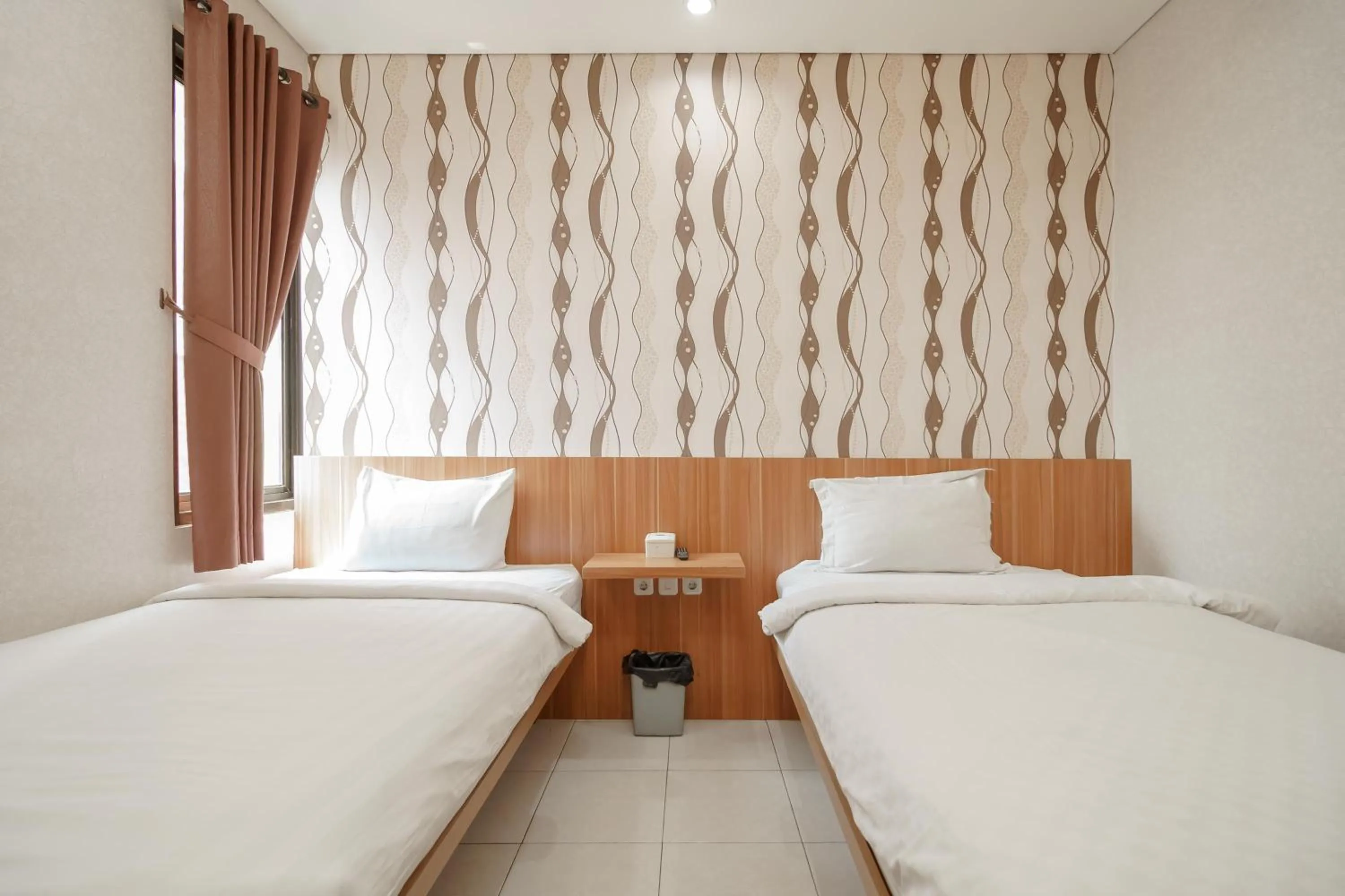 Bed in Green Apple Residence near Sarinah Mitra RedDoorz