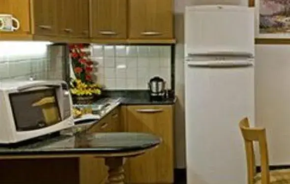 Kitchen or kitchenette, Kitchen/Kitchenette in Savoy Suites Noida