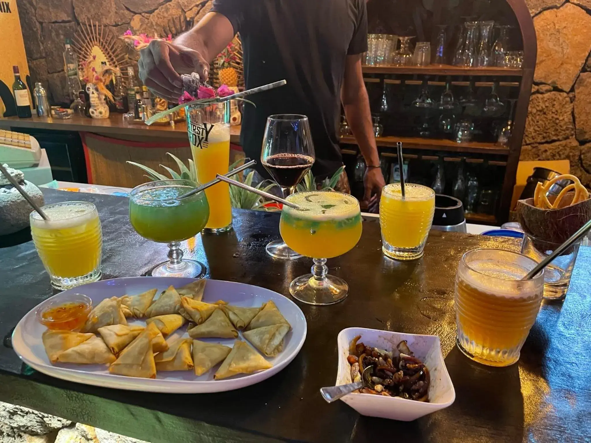 Drinks in Sous Le Badamier Guest House Restaurant Bar