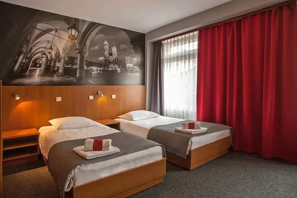 Bed in Hotel Alexander