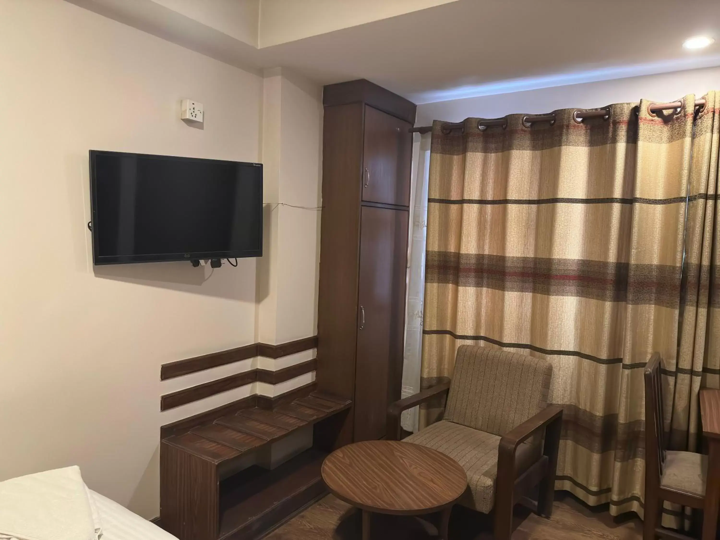 TV and multimedia, TV/Entertainment Center in Hotel Everest Nepal