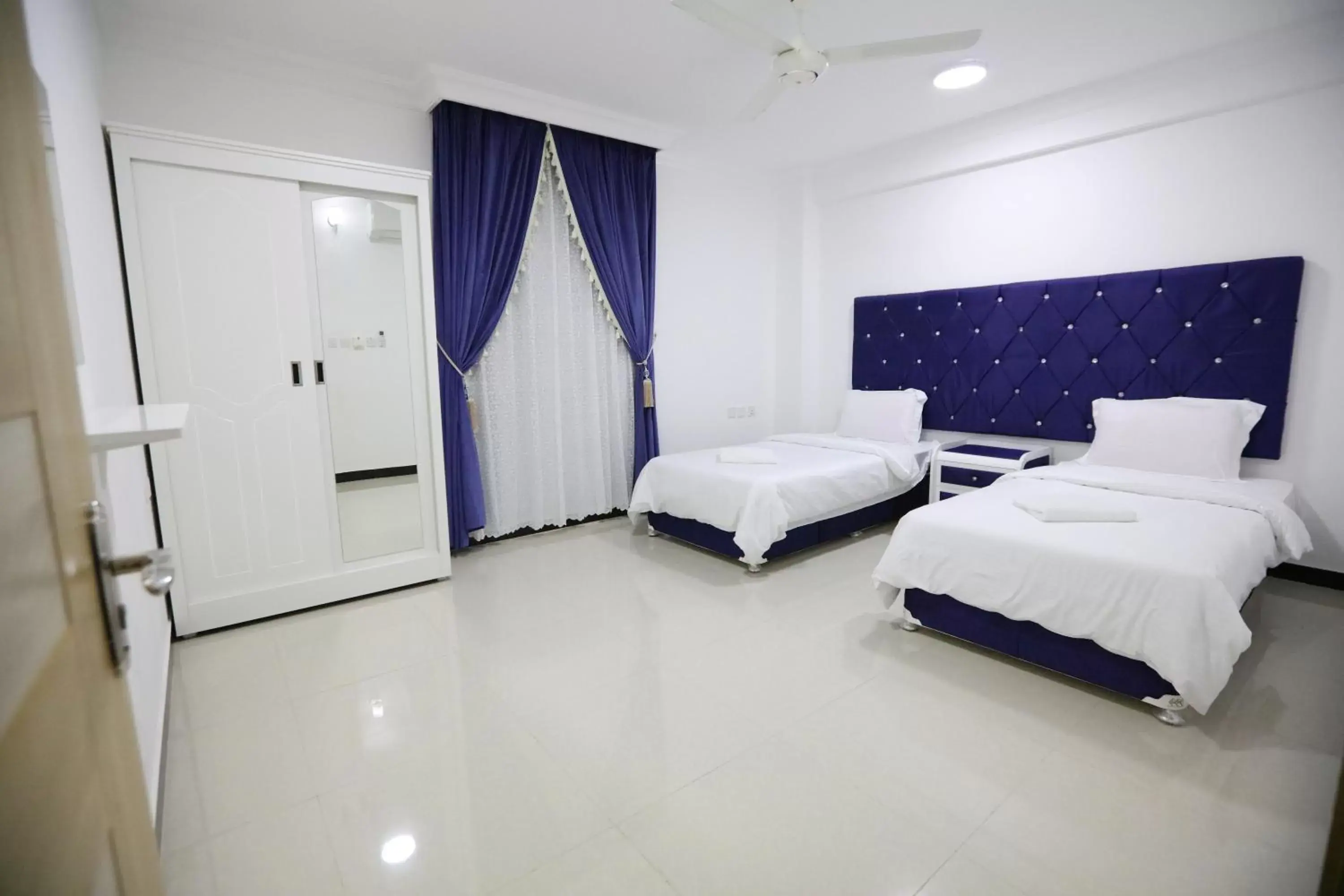 Bed in Al Rayyan Hotel Apartments Muscat