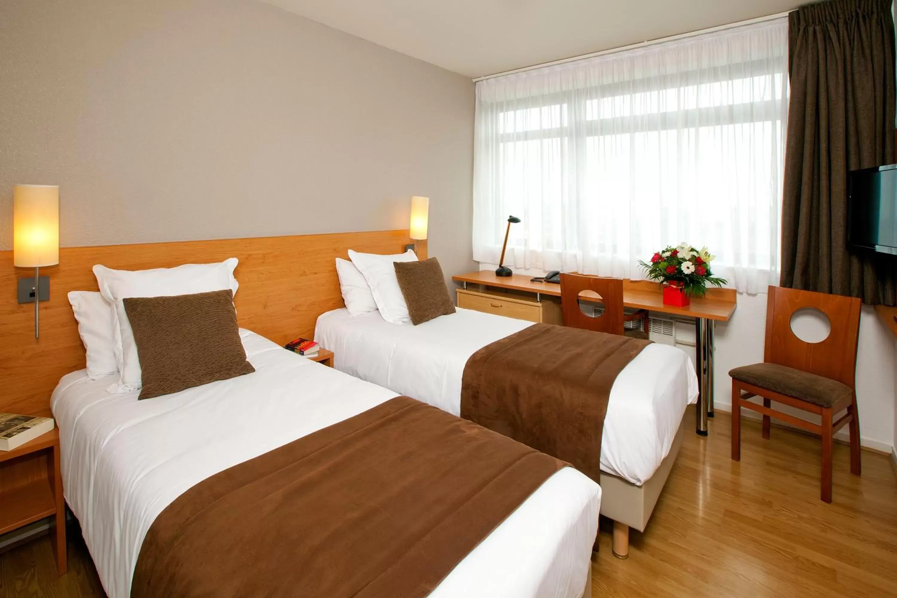 Bedroom, Bed in Séjours & Affaires Rennes de Bretagne