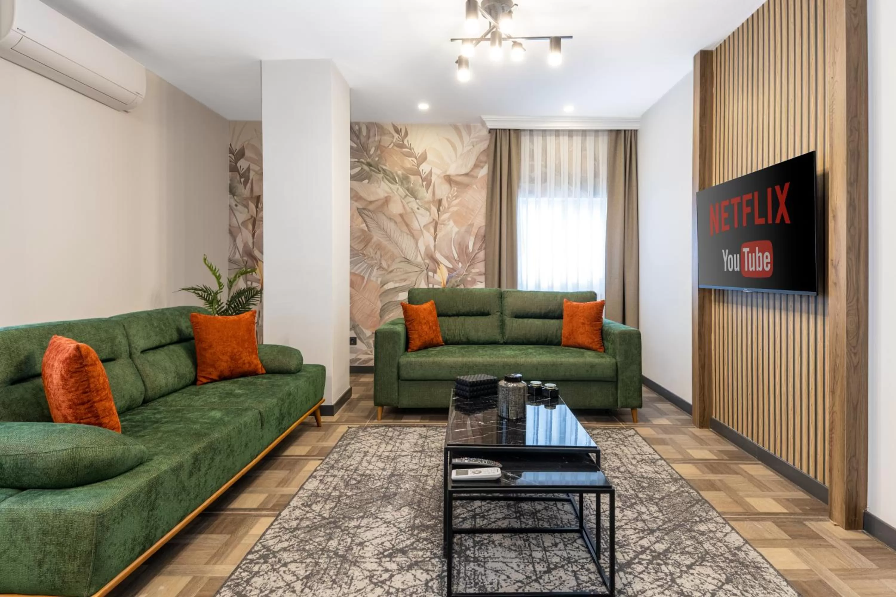 Communal lounge/ TV room in BayMari Suites City Life