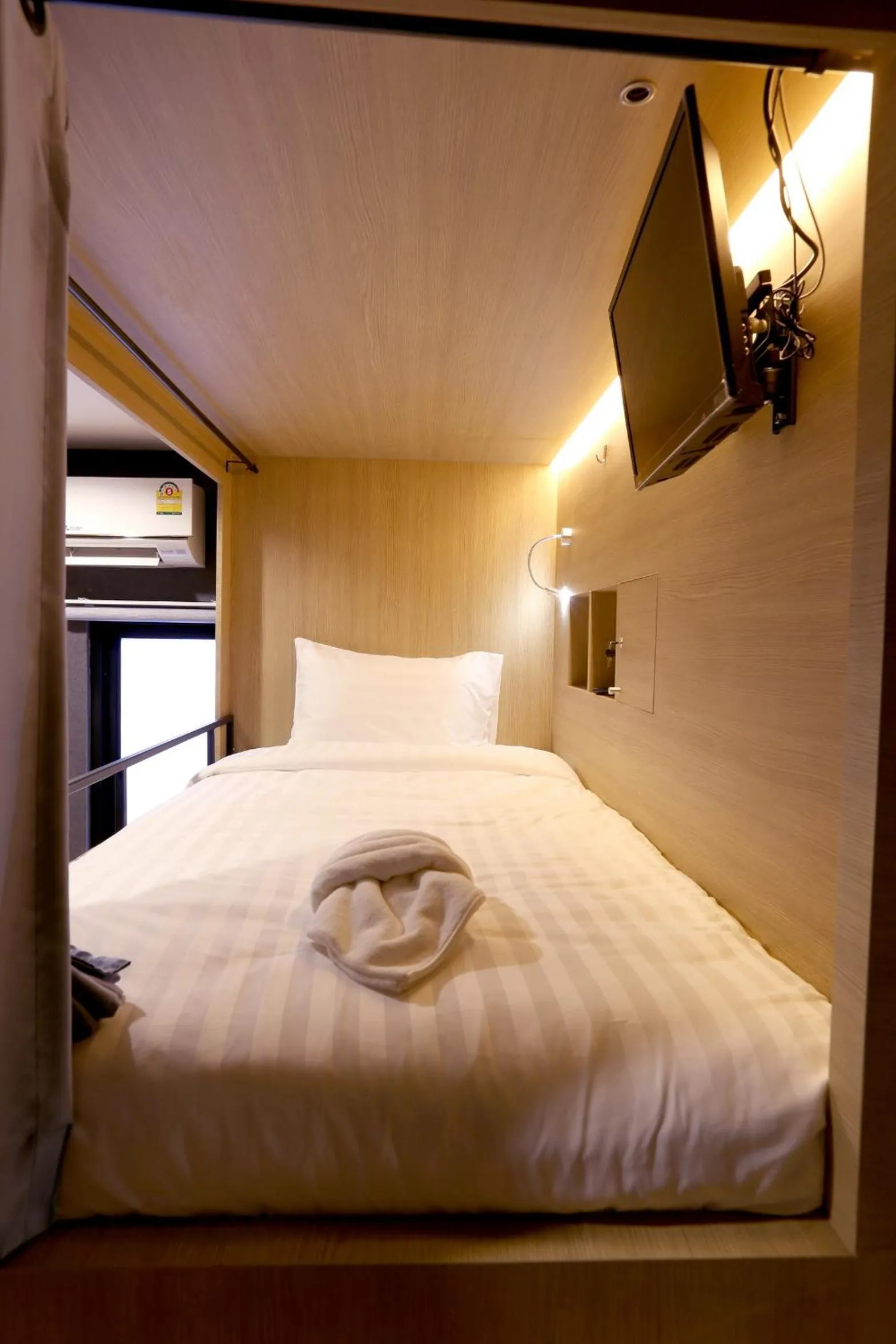 Bed in The Printing House Poshtel