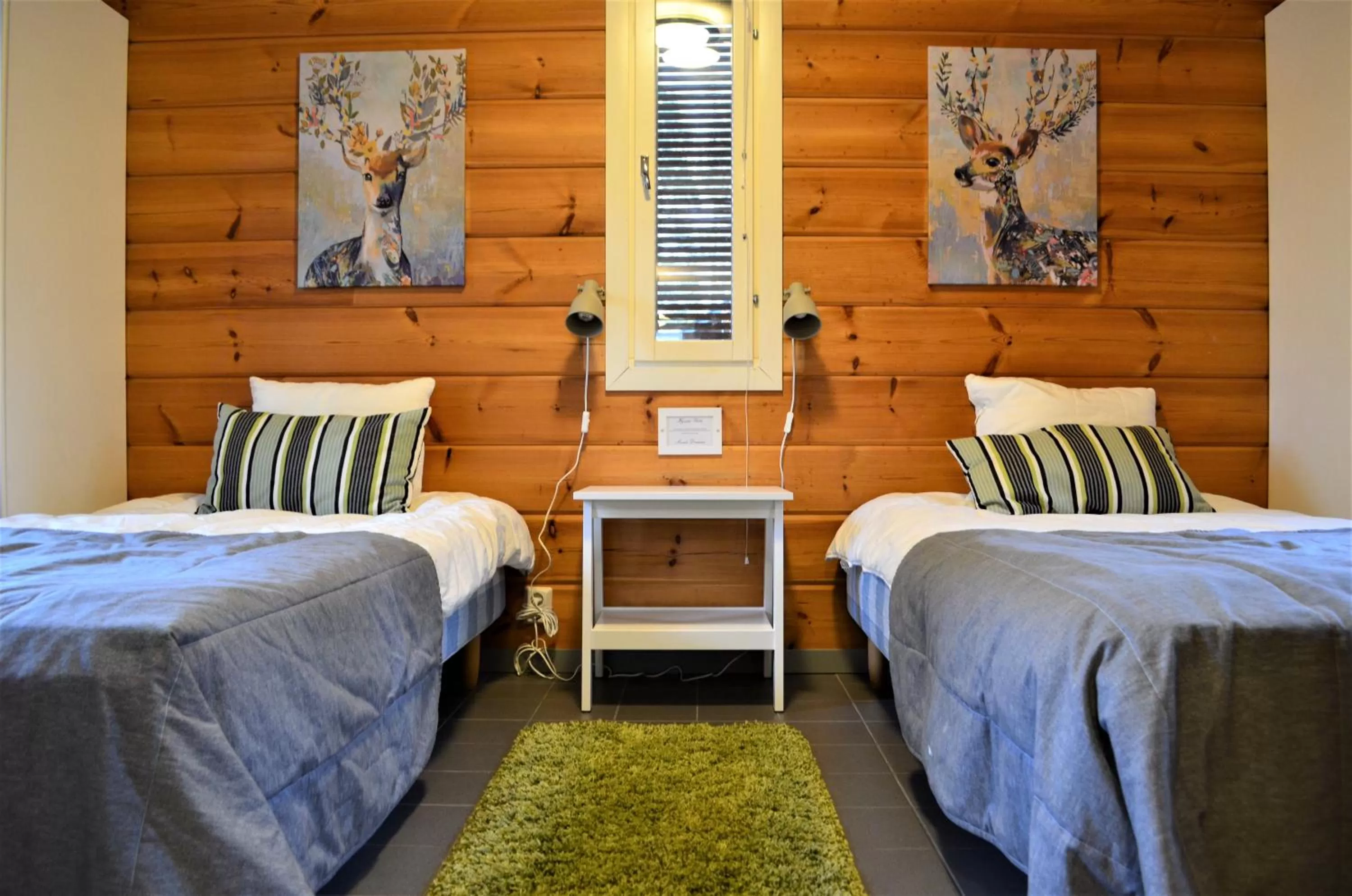 Bed in Rauhalahti Holiday Homes