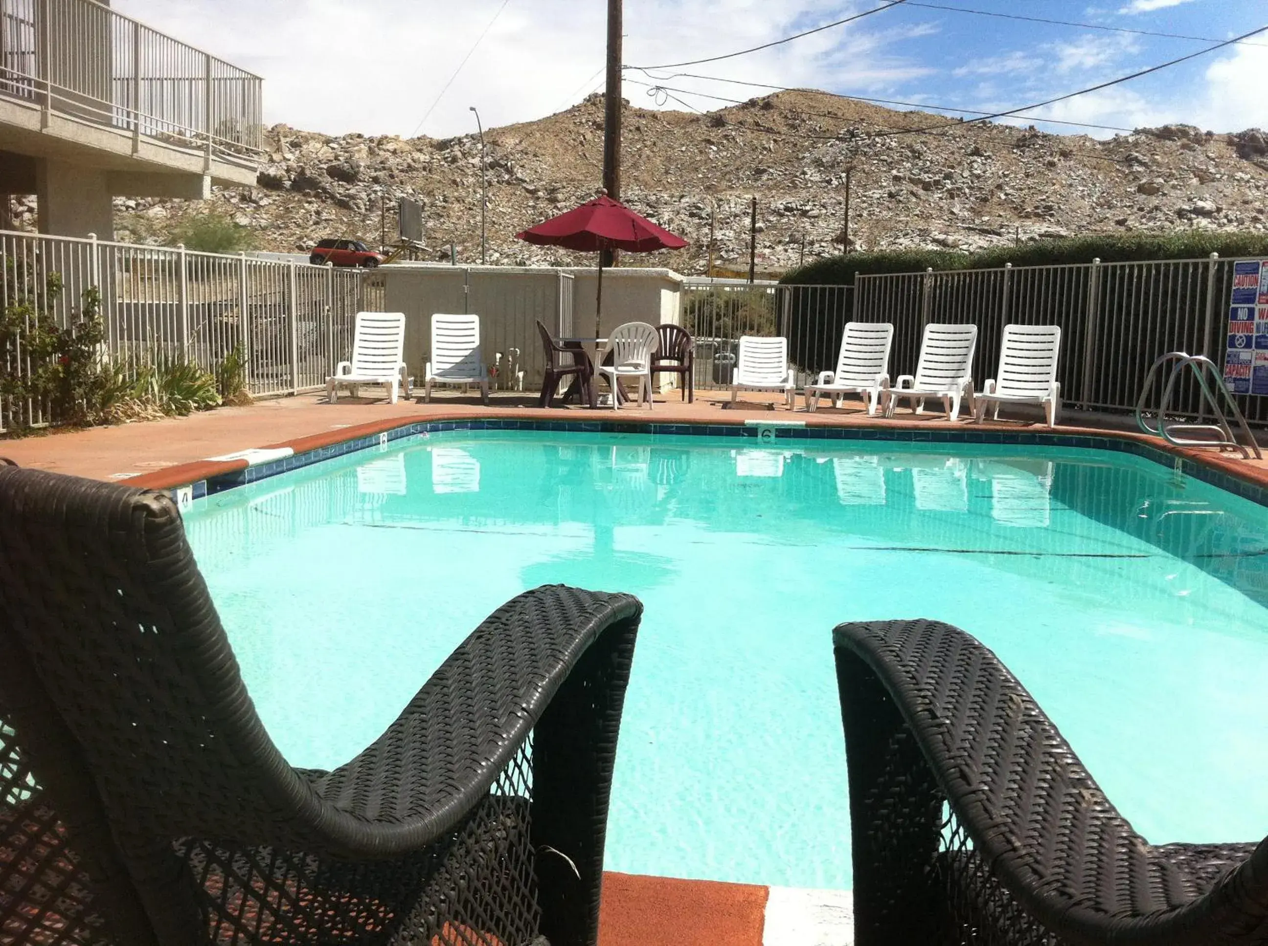 Day, Swimming Pool in Hilltop Inn & Suites