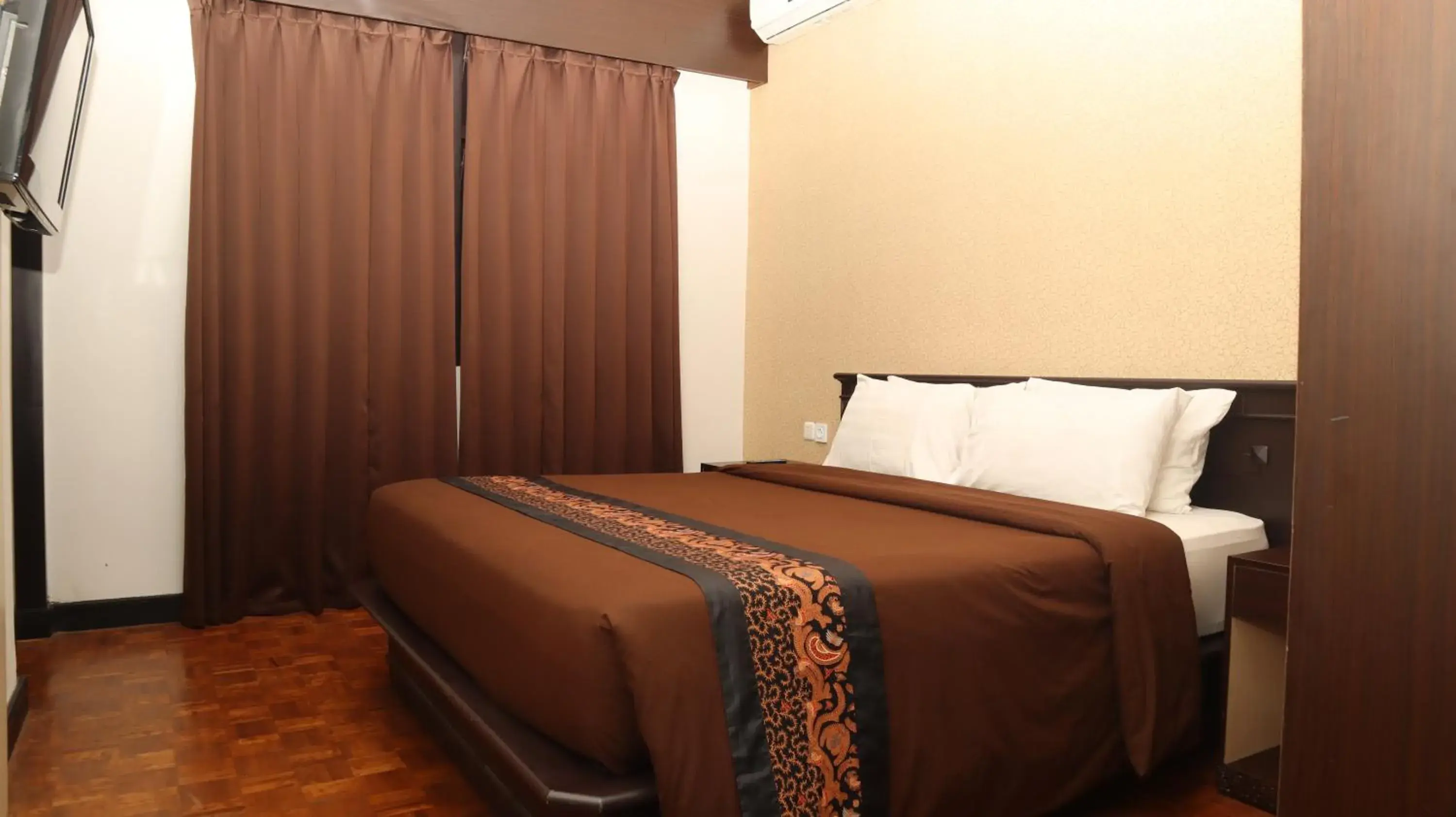 Bed in Kusuma Agrowisata Resort & Convention Bed in Kusuma Agrowisata Resort & Convention