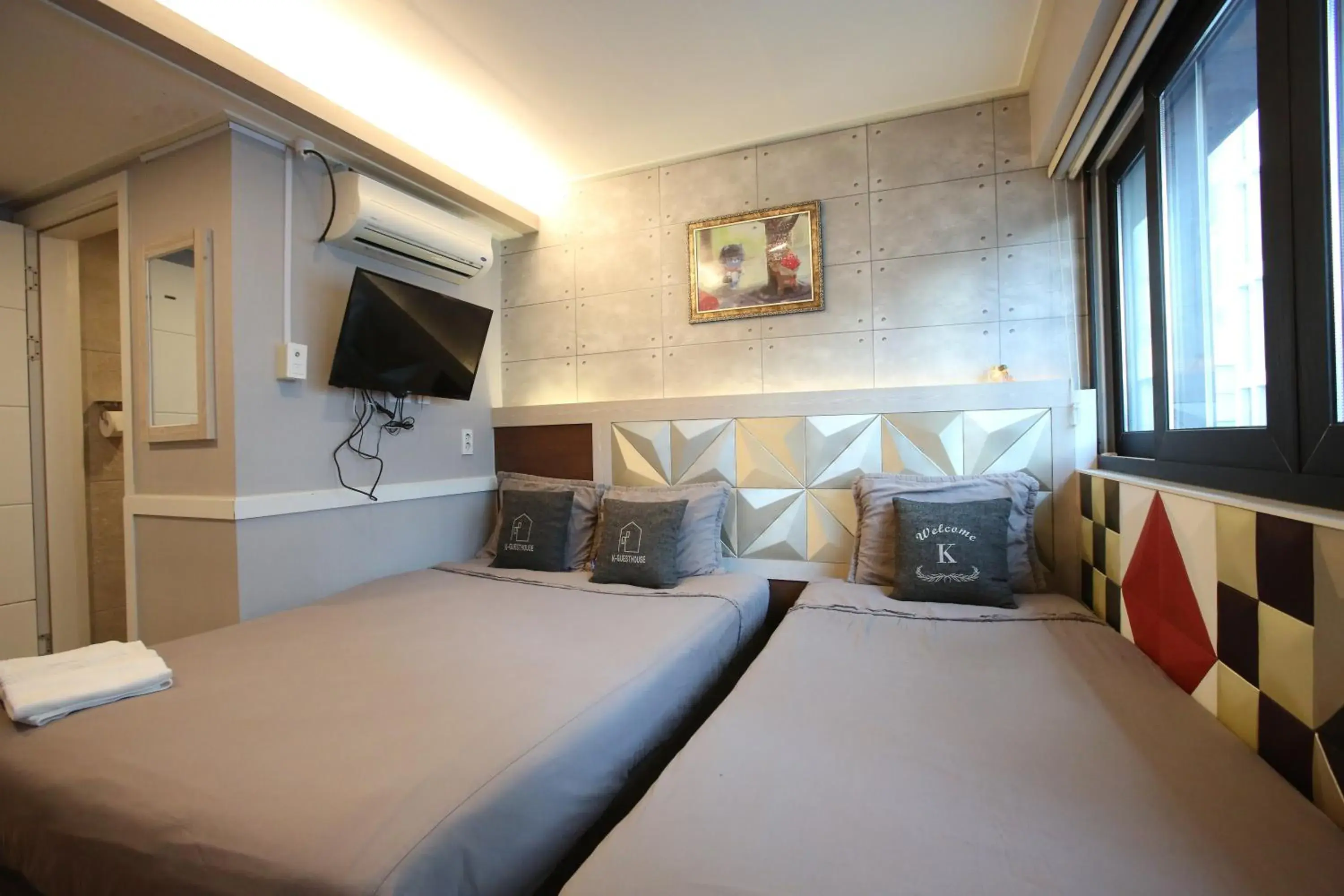 Bed in K Guesthouse Seomyeon