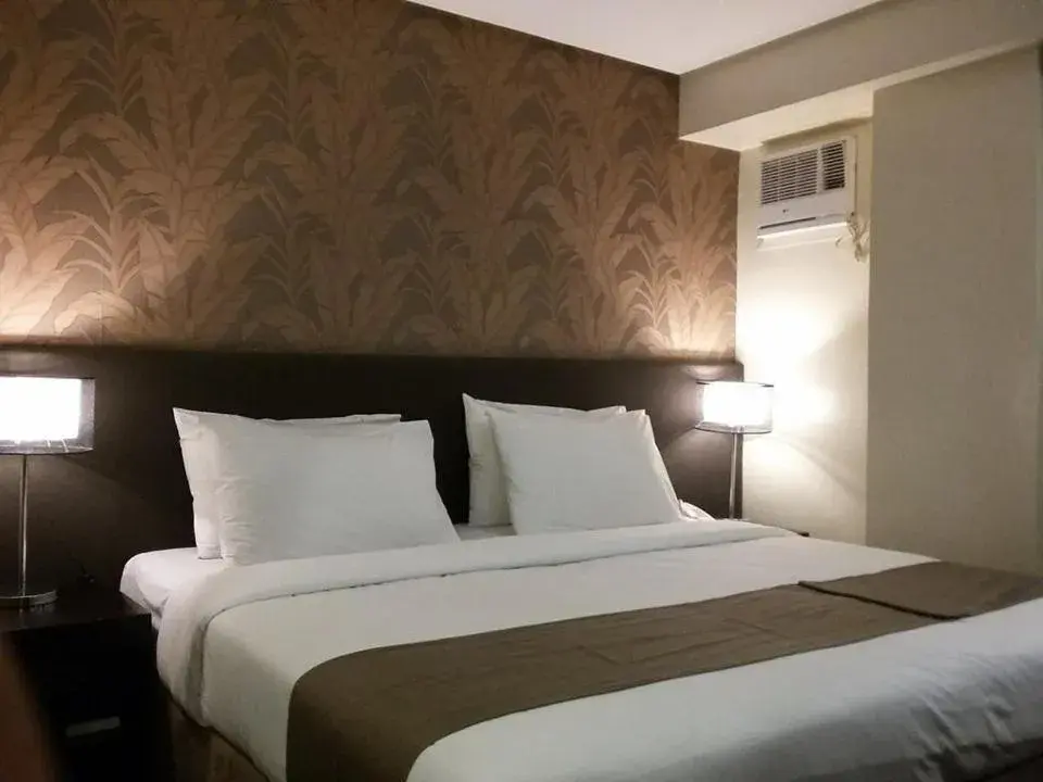 Bed in Gt Hotel Iloilo