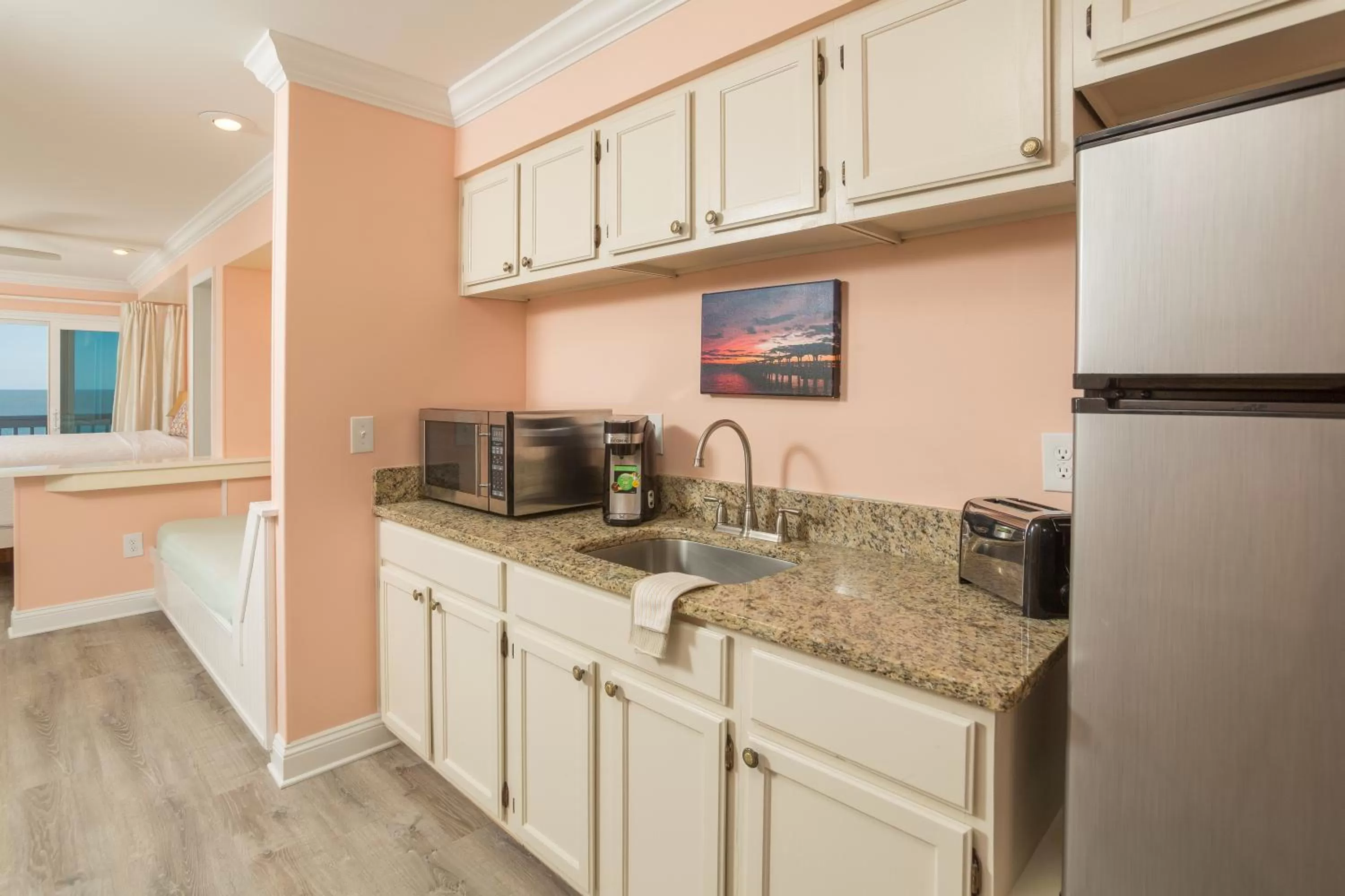 Bed, TV/Entertainment Center in The Saint Augustine Beach House