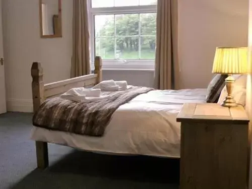 Bedroom, Bed in Stonehenge Inn & Shepherd's Huts