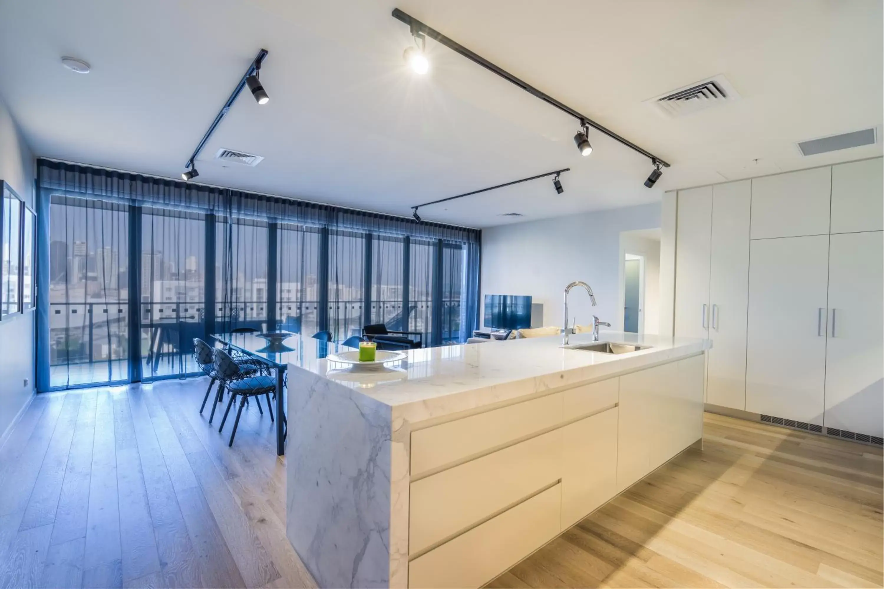 Dining area in Arena Apartments by CLLIX