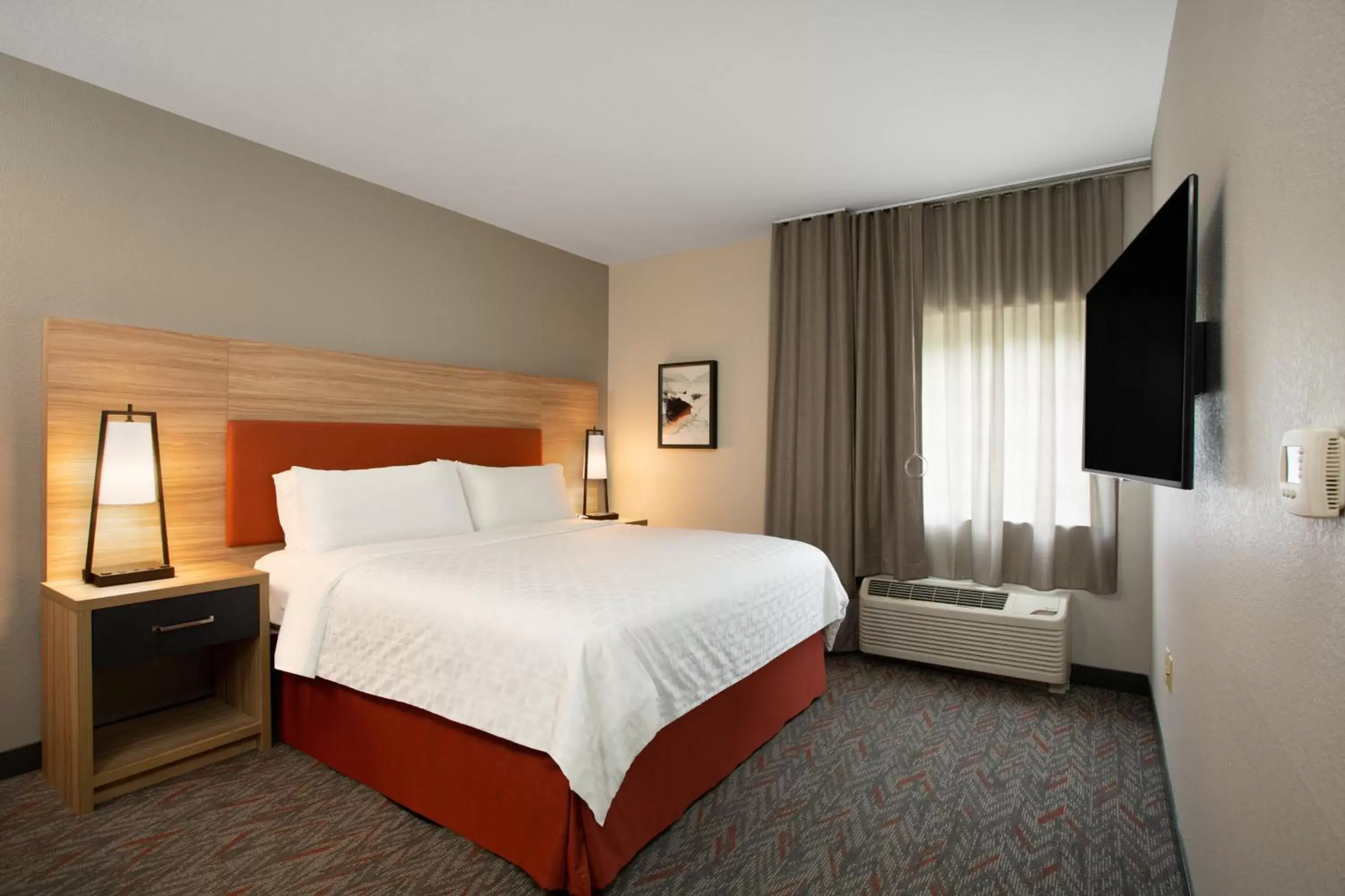 Photo of the whole room, Bed in Candlewood Suites Apex Raleigh Area, an IHG Hotel