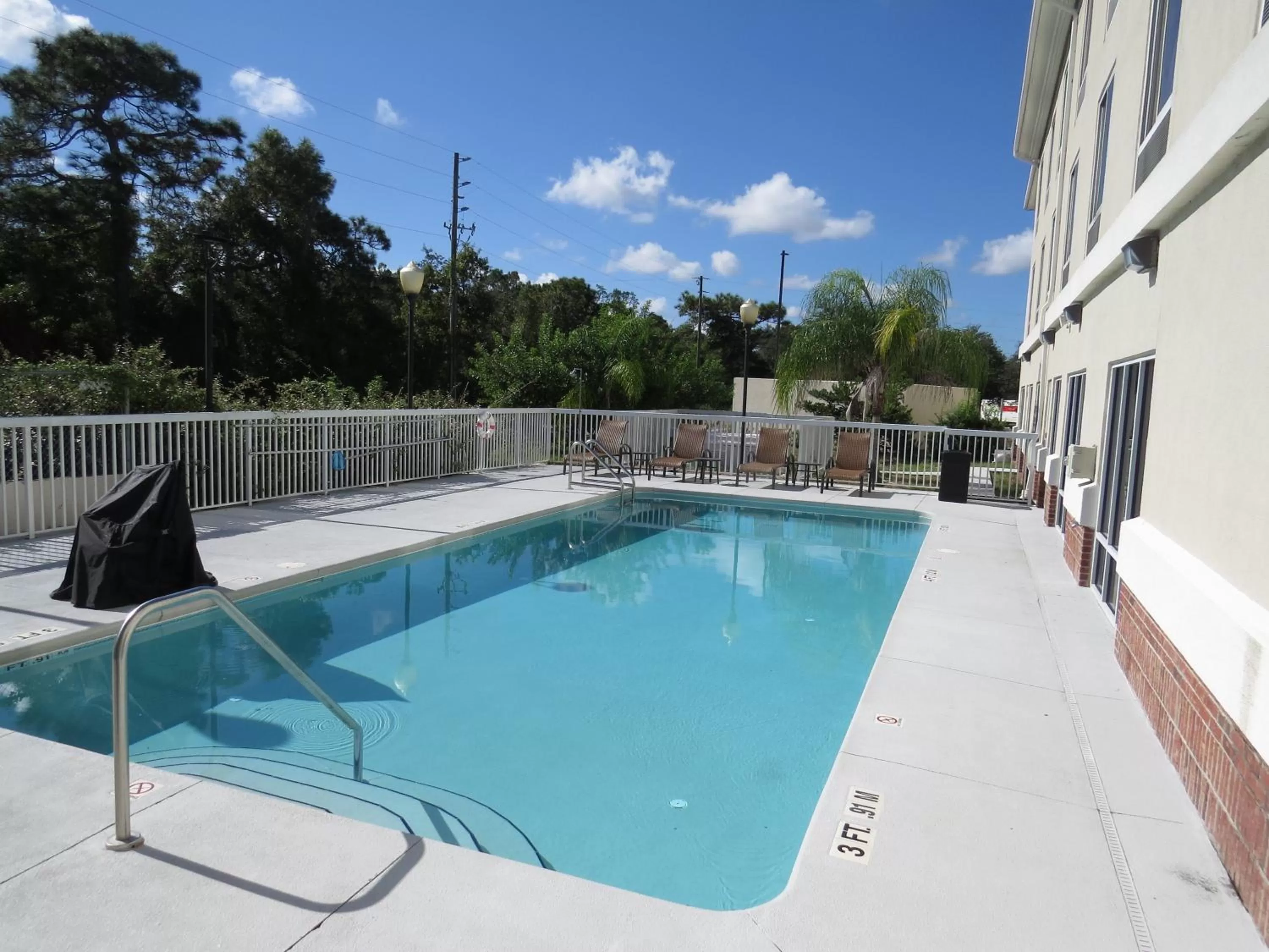 Swimming pool in Holiday Inn Express & Suites Spring Hill by IHG