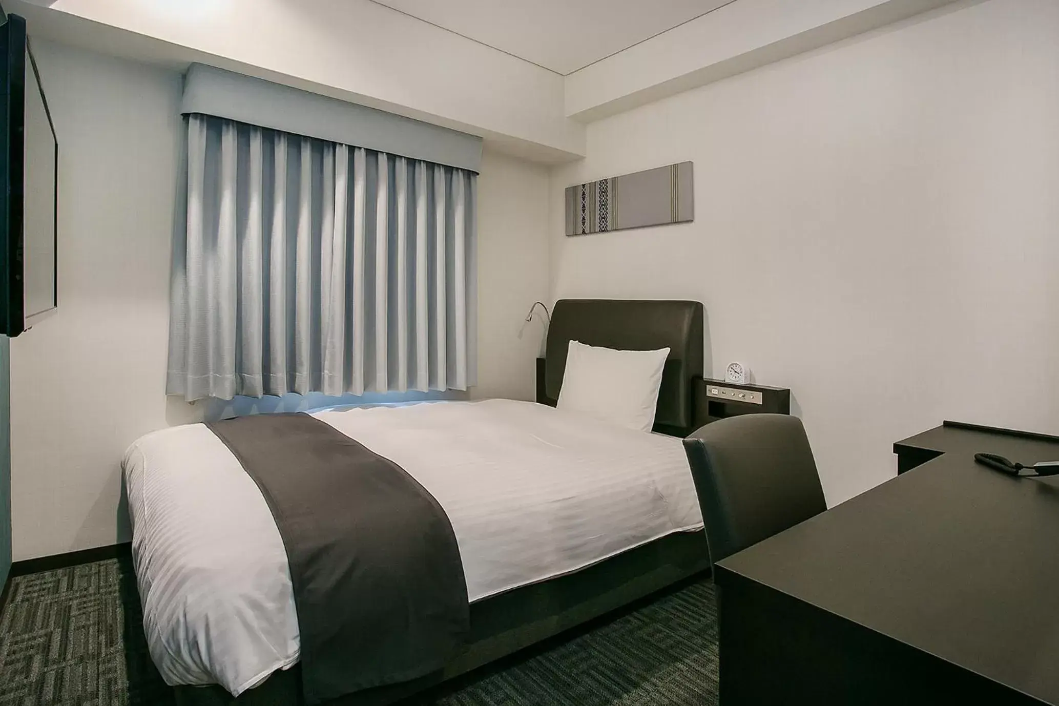 Bed in Mars Garden Hotel Hakata