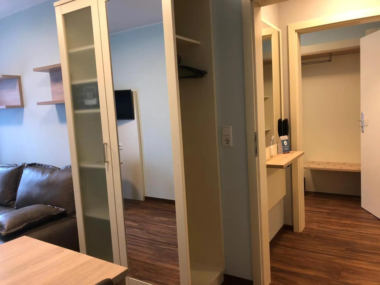 Living room, Bed in Trip Inn Residence City Center