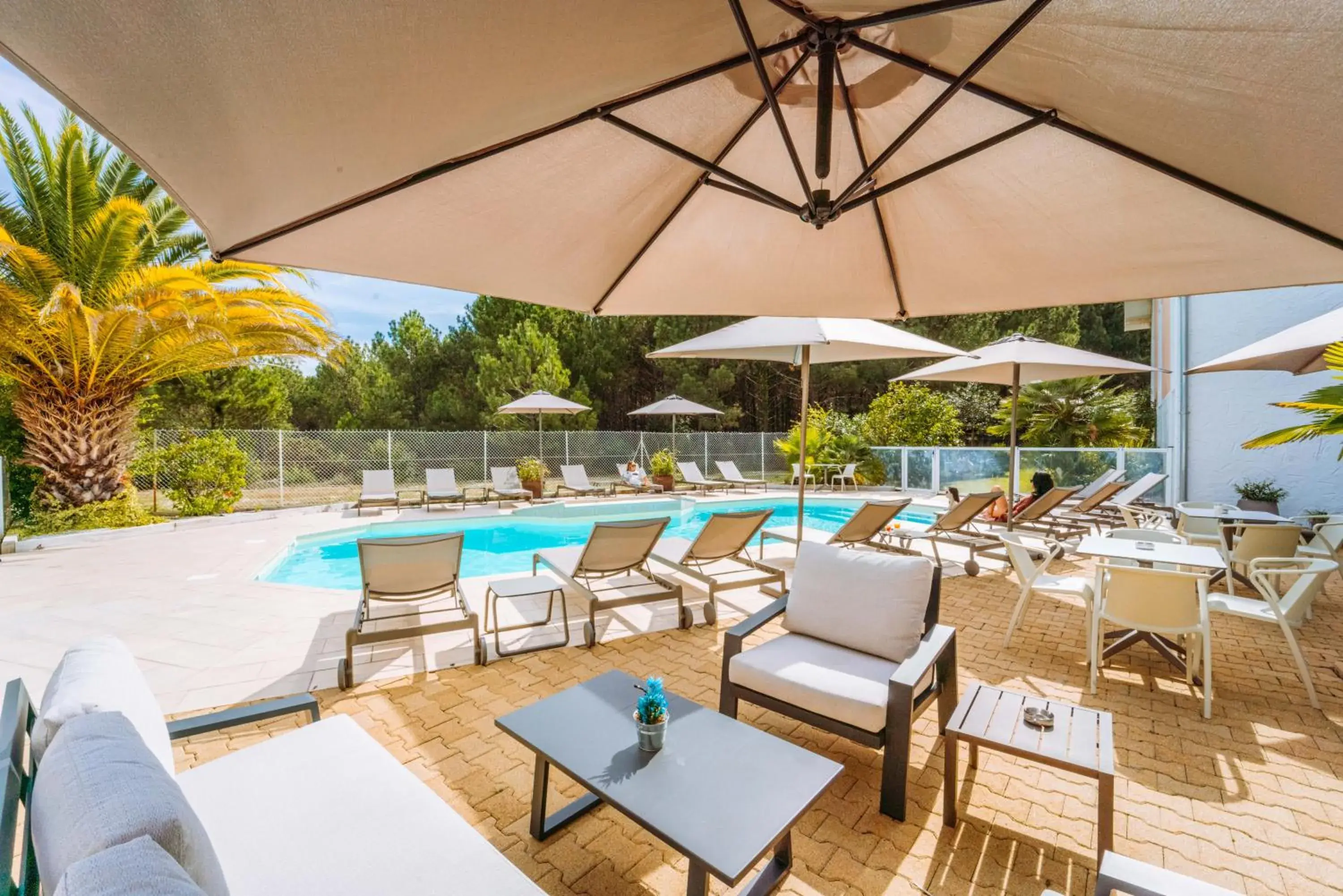 Patio, Swimming Pool in Hôtel Restaurant La Forestière