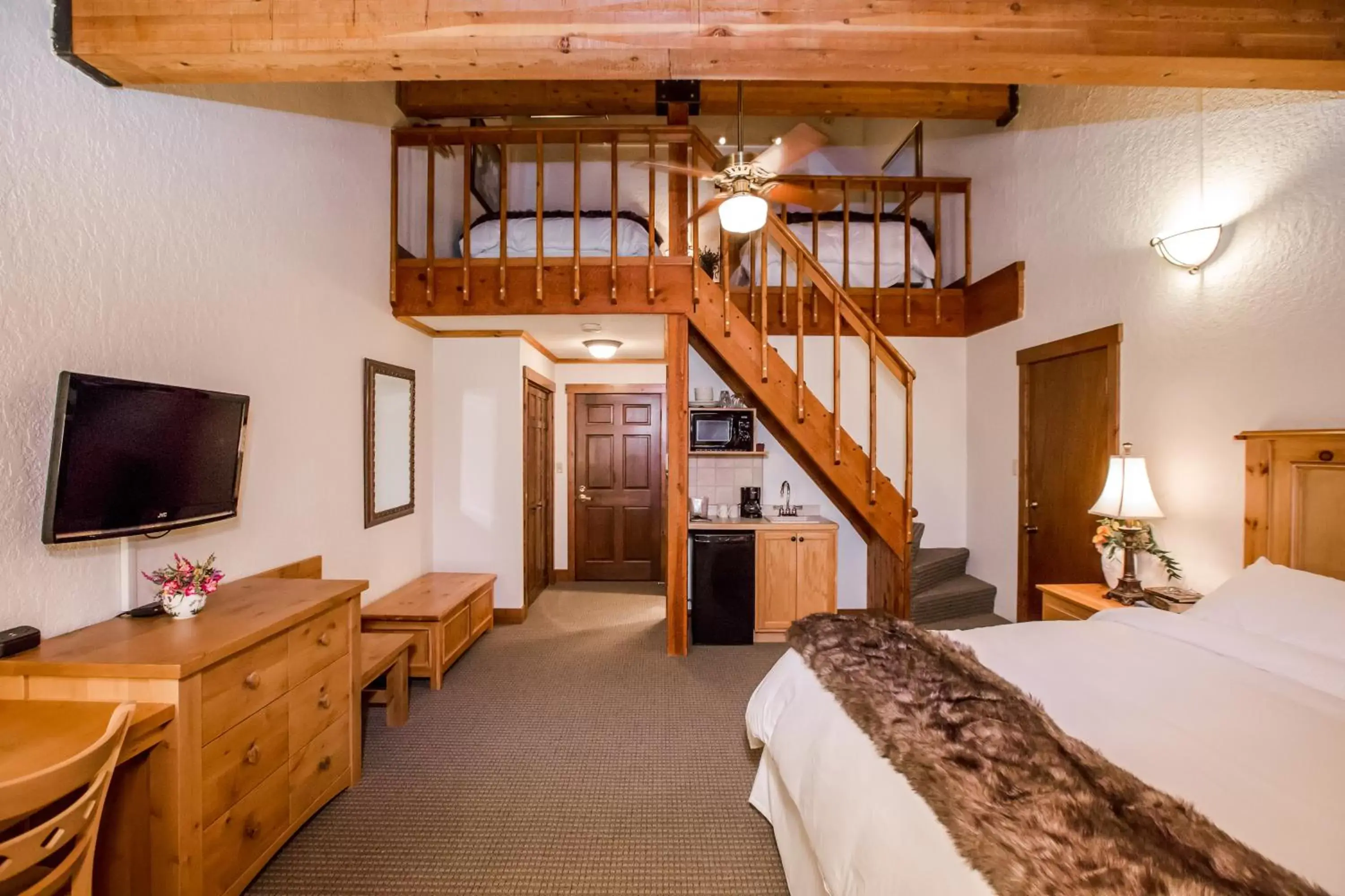 Photo of the whole room, TV/Entertainment Center in Kandahar Lodge at Whitefish Mountain Resort