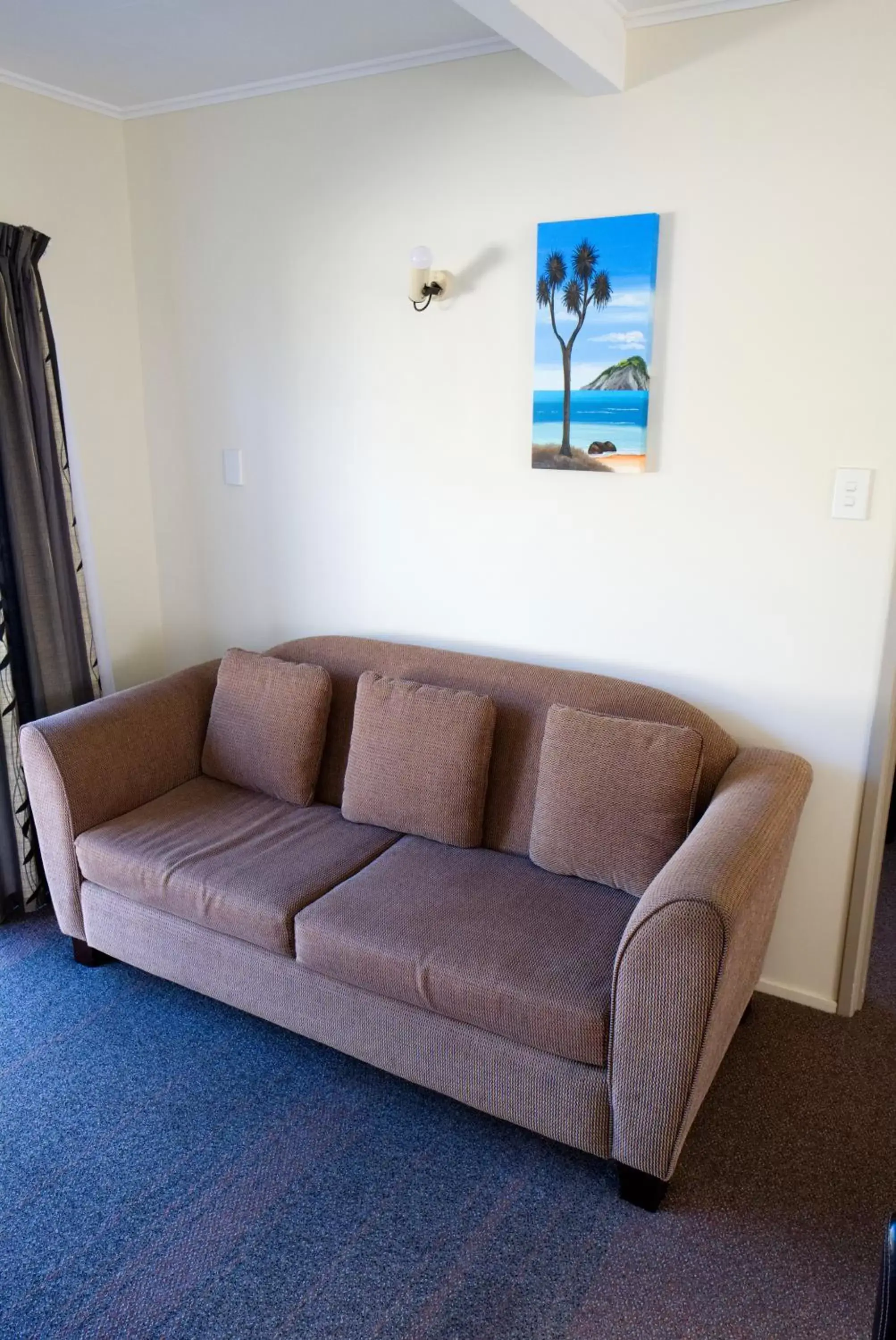 Bed, Seating Area in Tairua Shores Motel