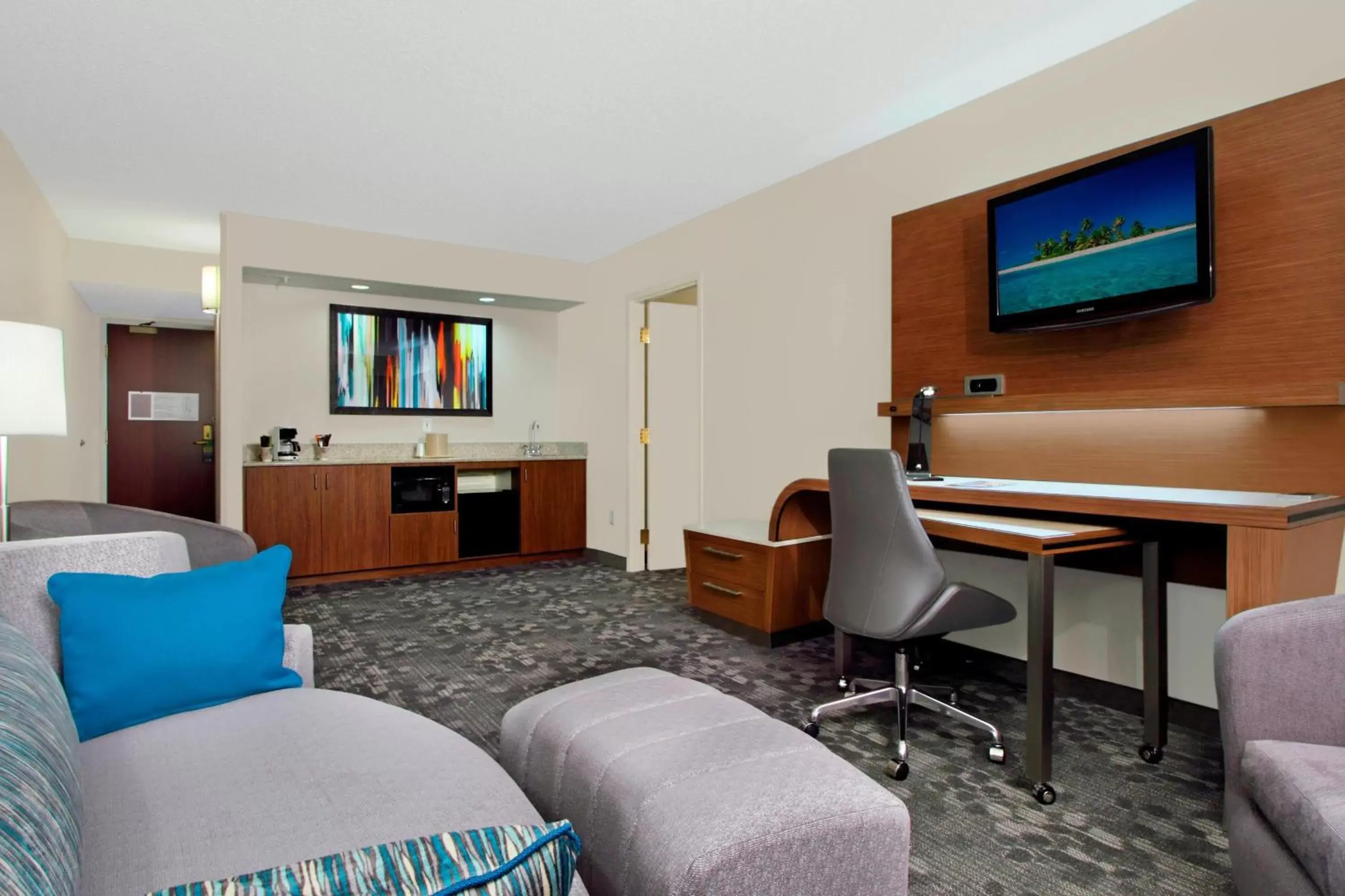 Photo of the whole room, TV/Entertainment Center in Courtyard by Marriott Cocoa Beach Cape Canaveral